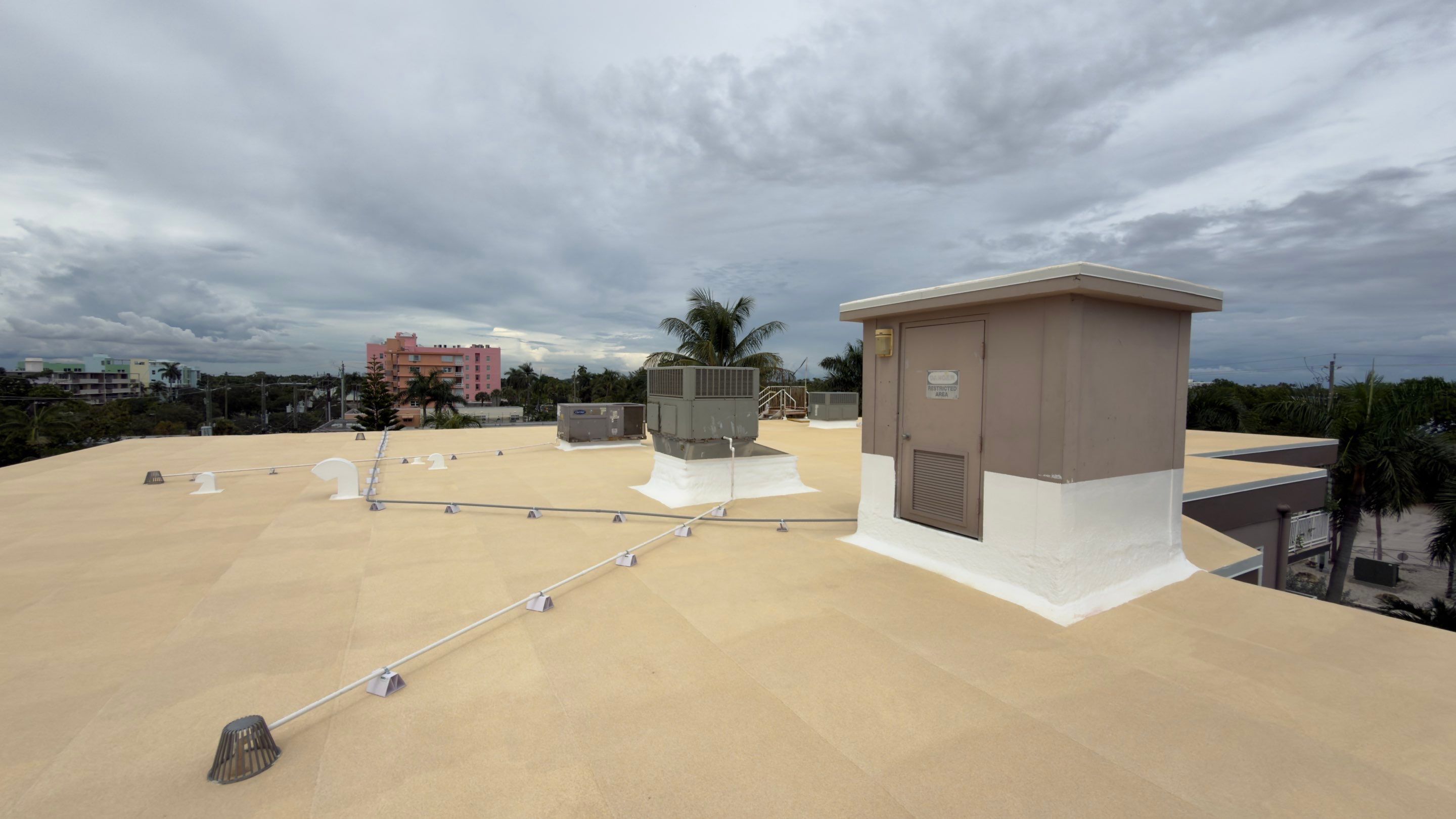 Commercial Roof Restoration for Lake Worth Beach Flat Roof Project by Roof King LLC