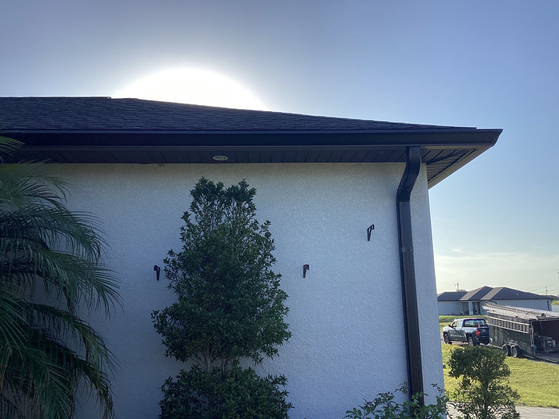 Black Seamless Gutters using 6 Inch Seamless Gutters in Cape Coral FL by Gutter Professors