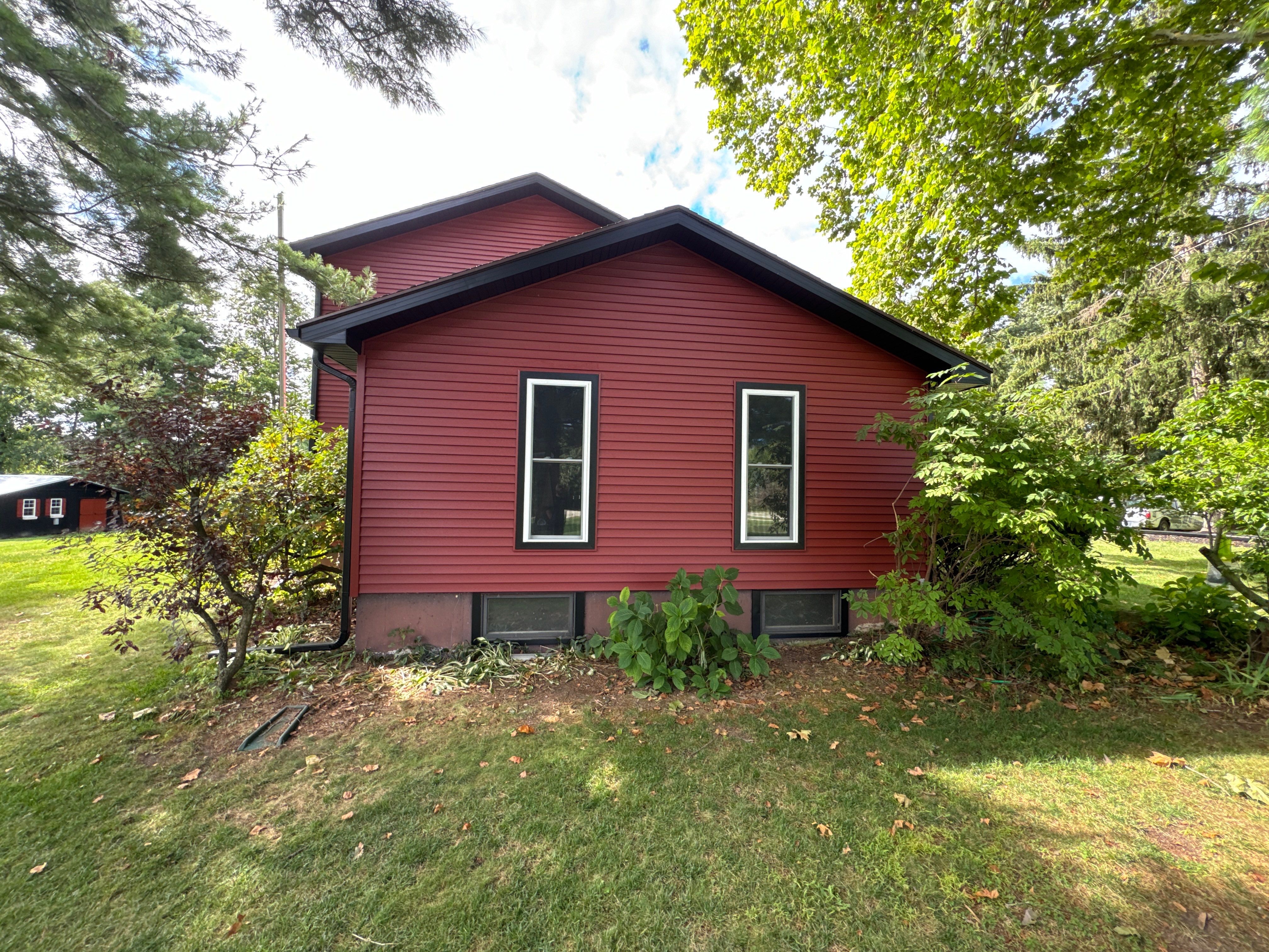 Vinyl Window & Siding Project in rand Ledge by 42 North Construction, LLC.