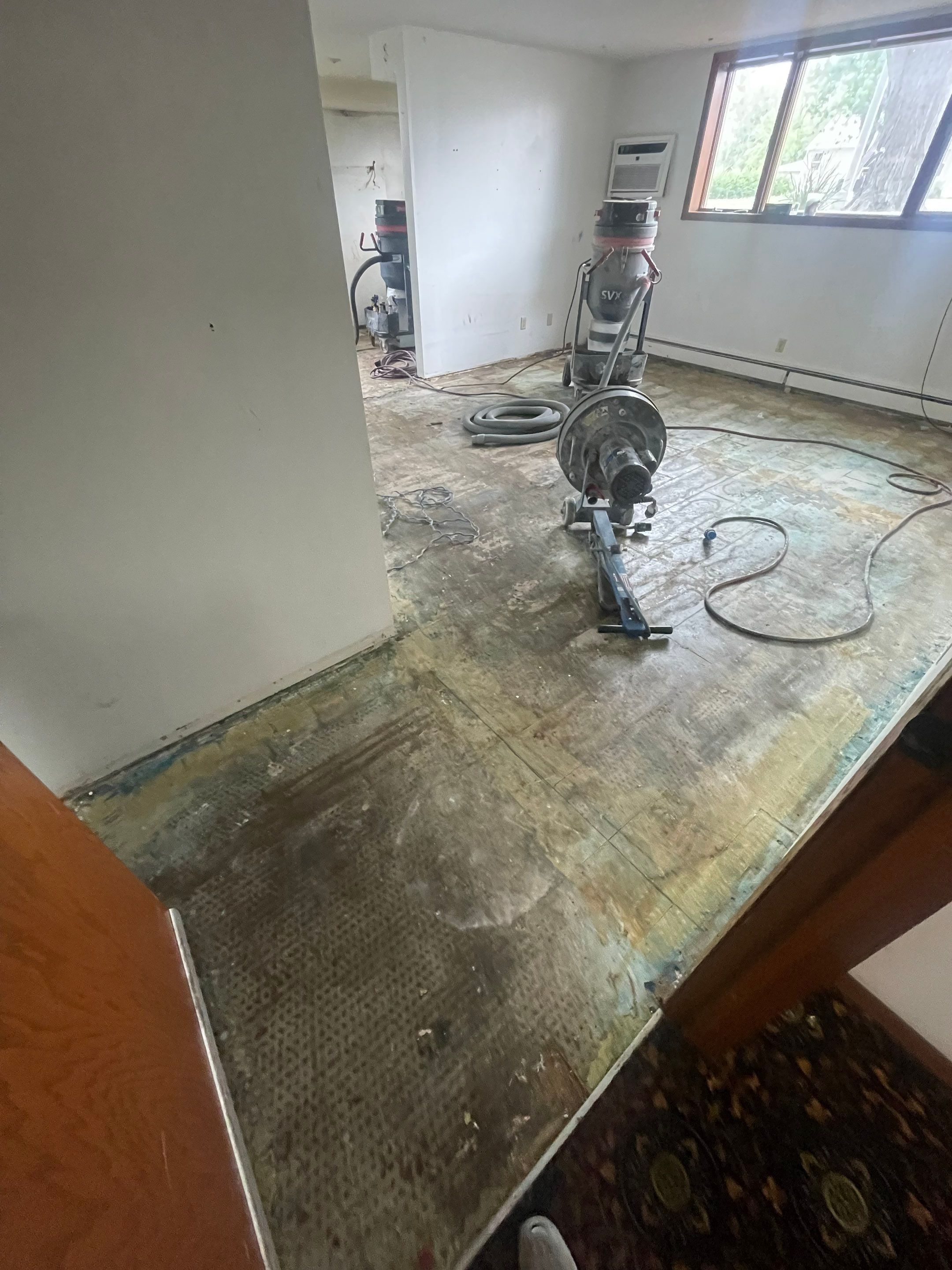 Commercial Subfloor Preparation and Flooring Restoration in Sioux Falls by Select Painting, Coatings & Garage Cabinets