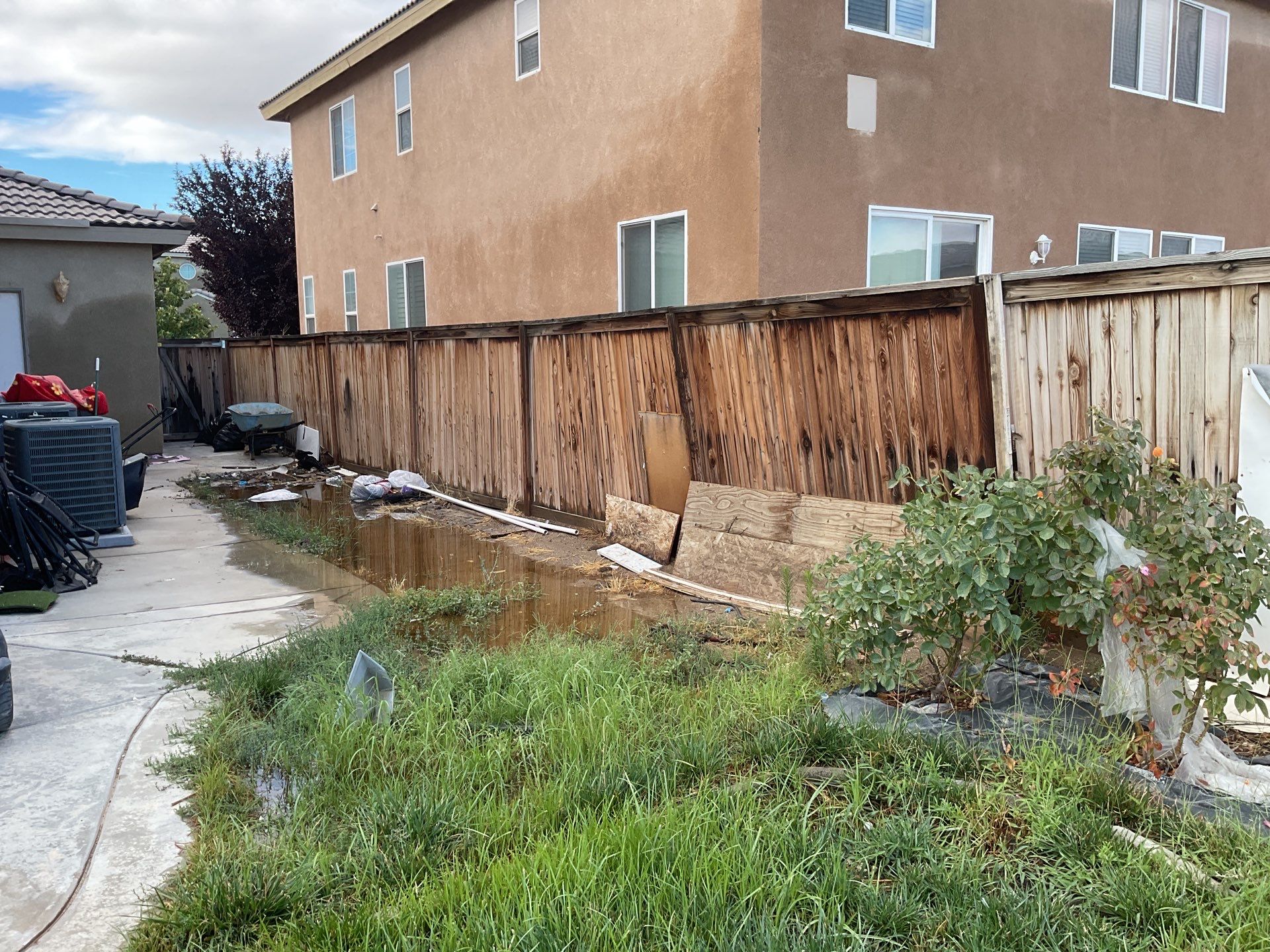 Tan Vinyl by Fence Guys Inc. 