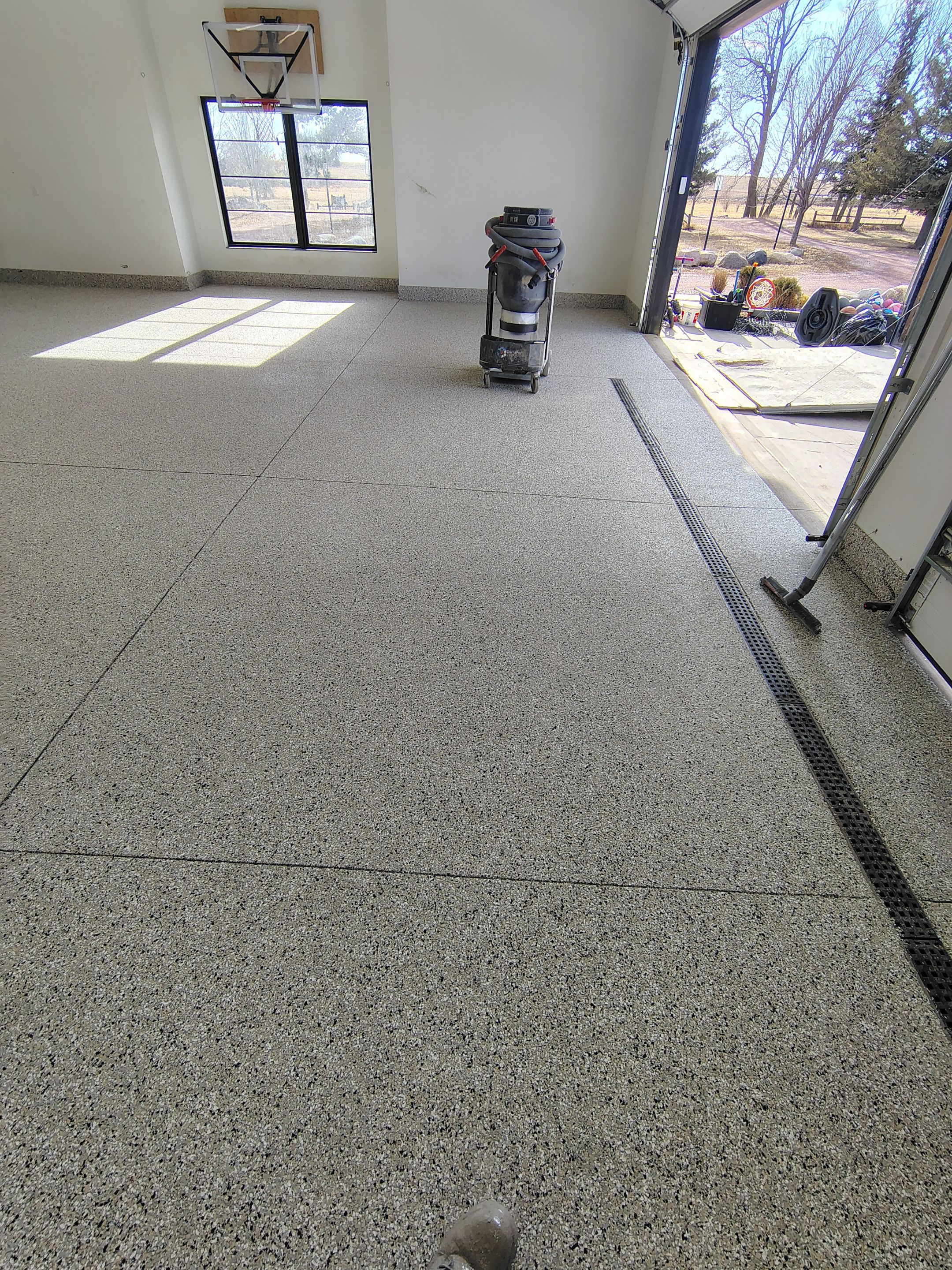 Epoxy Flake Garage Floor and Stair Coating in Sioux Falls by Select Painting, Coatings & Garage Cabinets