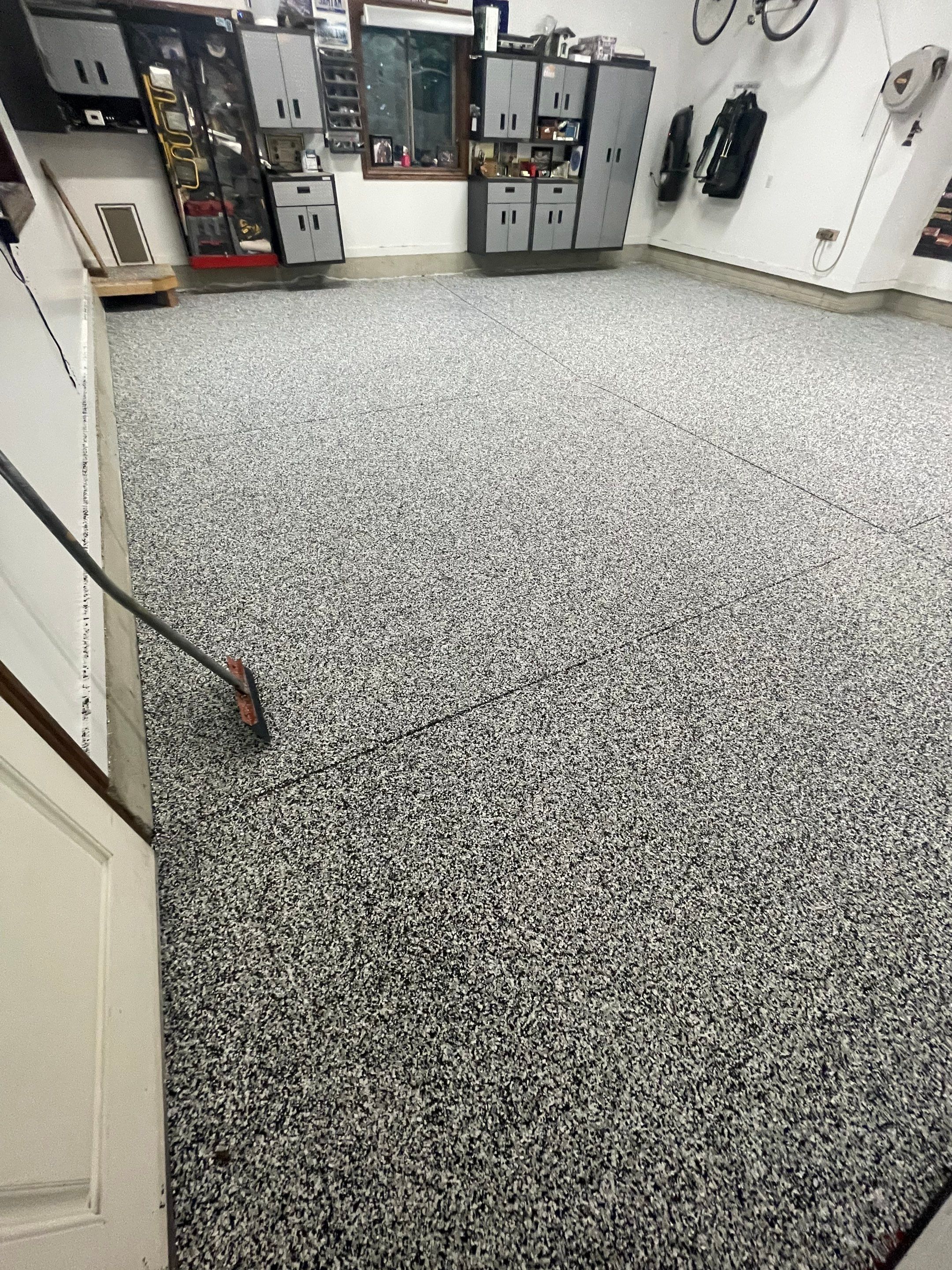 Garage Floor Coating and Domino Flake Finish in Sioux Falls by Select Painting, Coatings & Garage Cabinets