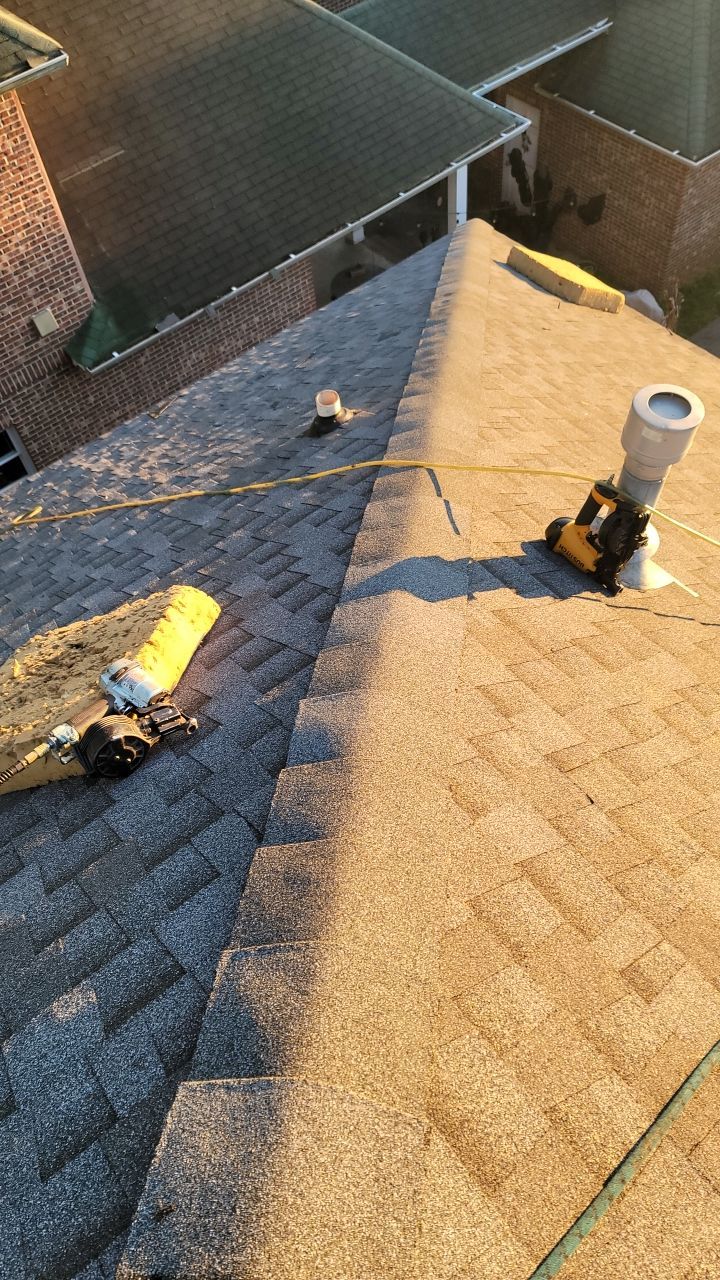 Residential Roofing Installation using Roof Replacement by American Roofing & Construction LLC