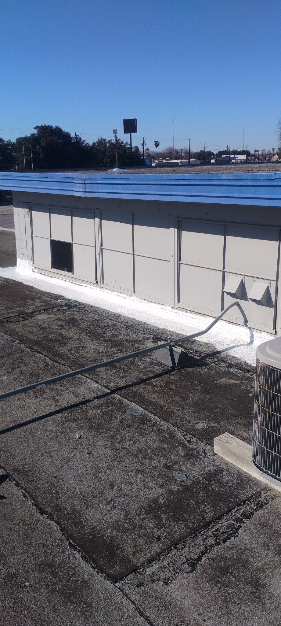 Commercial Silcone Roof Repair using Silcone Coating by Galvan Roofing and Construction