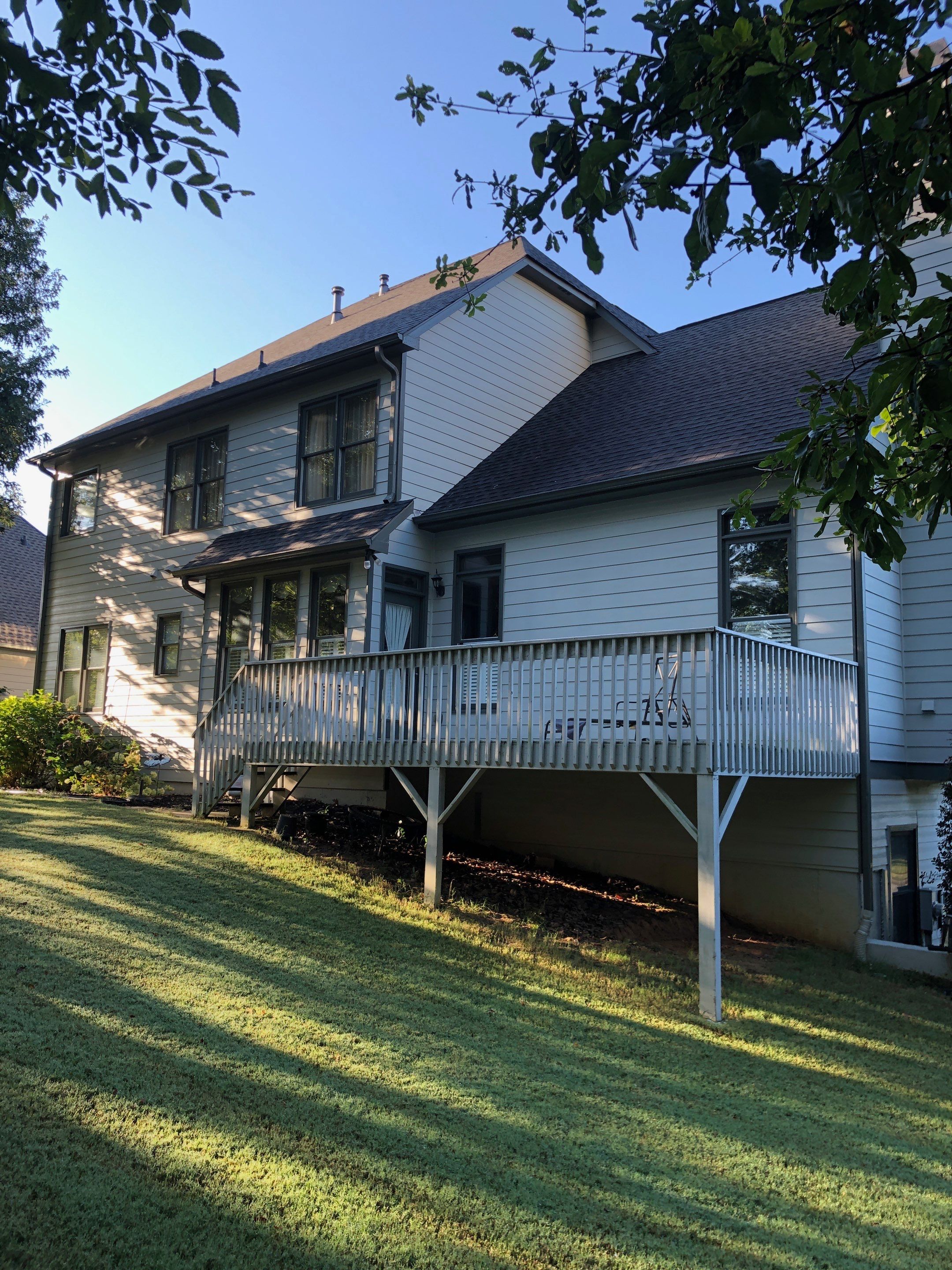 Custom Screened Porch Addition and Wood Deck in Acworth by Swift Home Renovations