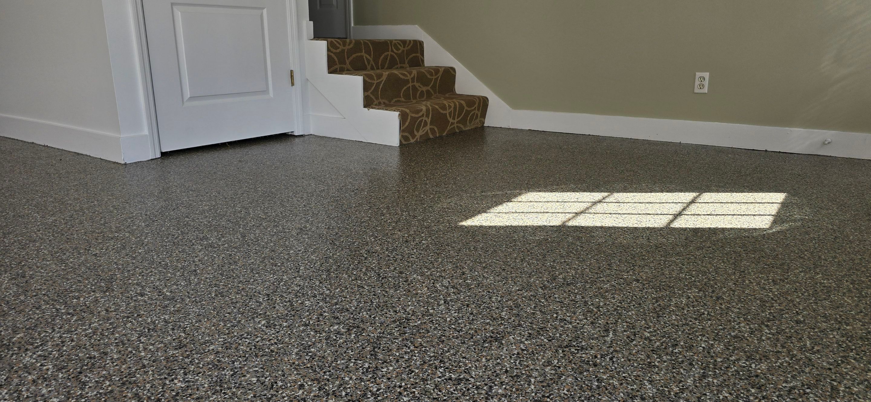 Garage Upgrade Using Custom Creekbed Blend by Elite Floor Solutions