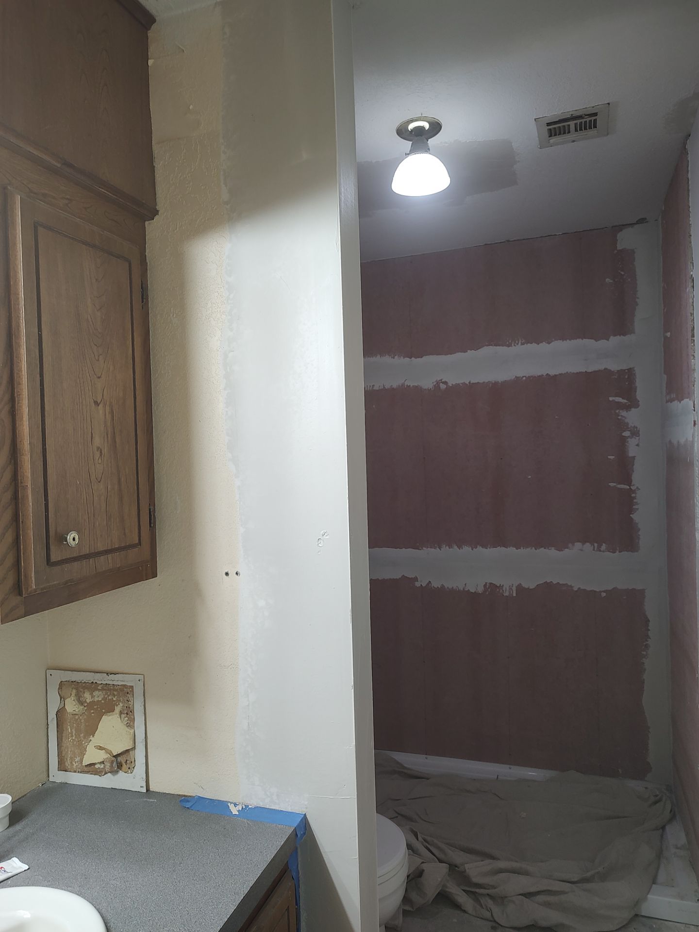 Bathroom remodel w/shower upgrade by In & Out Construction & Remodeling, LLC