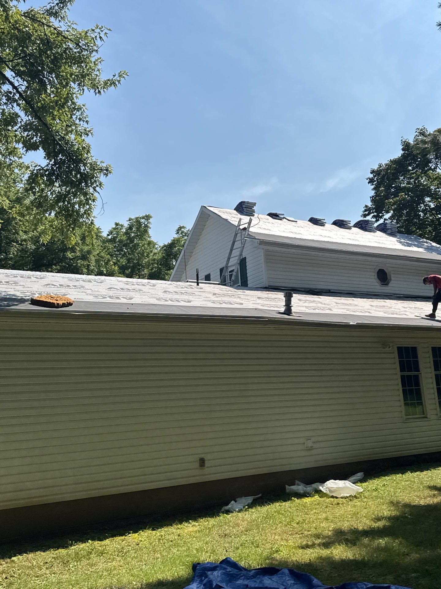 Residential Roofing Installation using GAF Timberline HDZ Oyster Grey by Rainstoppers Roofing