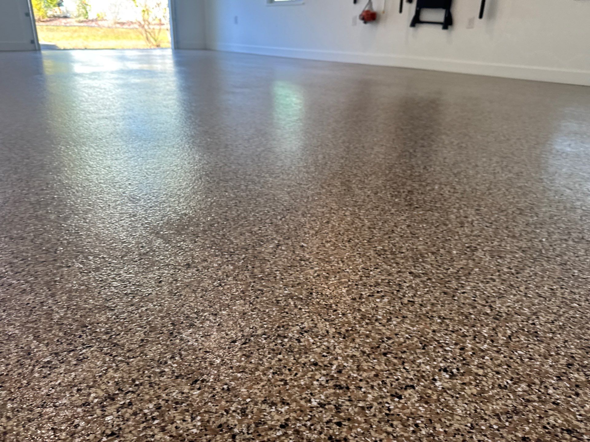 Garage in Hawthorne, FL in Sandstone by Cross Creek Concrete Coatings