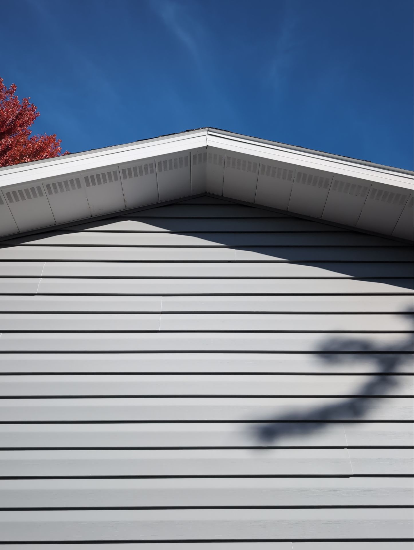 Siding Replacement with Vinyl Siding in Granite Gray by Gellings Roofing & Siding
