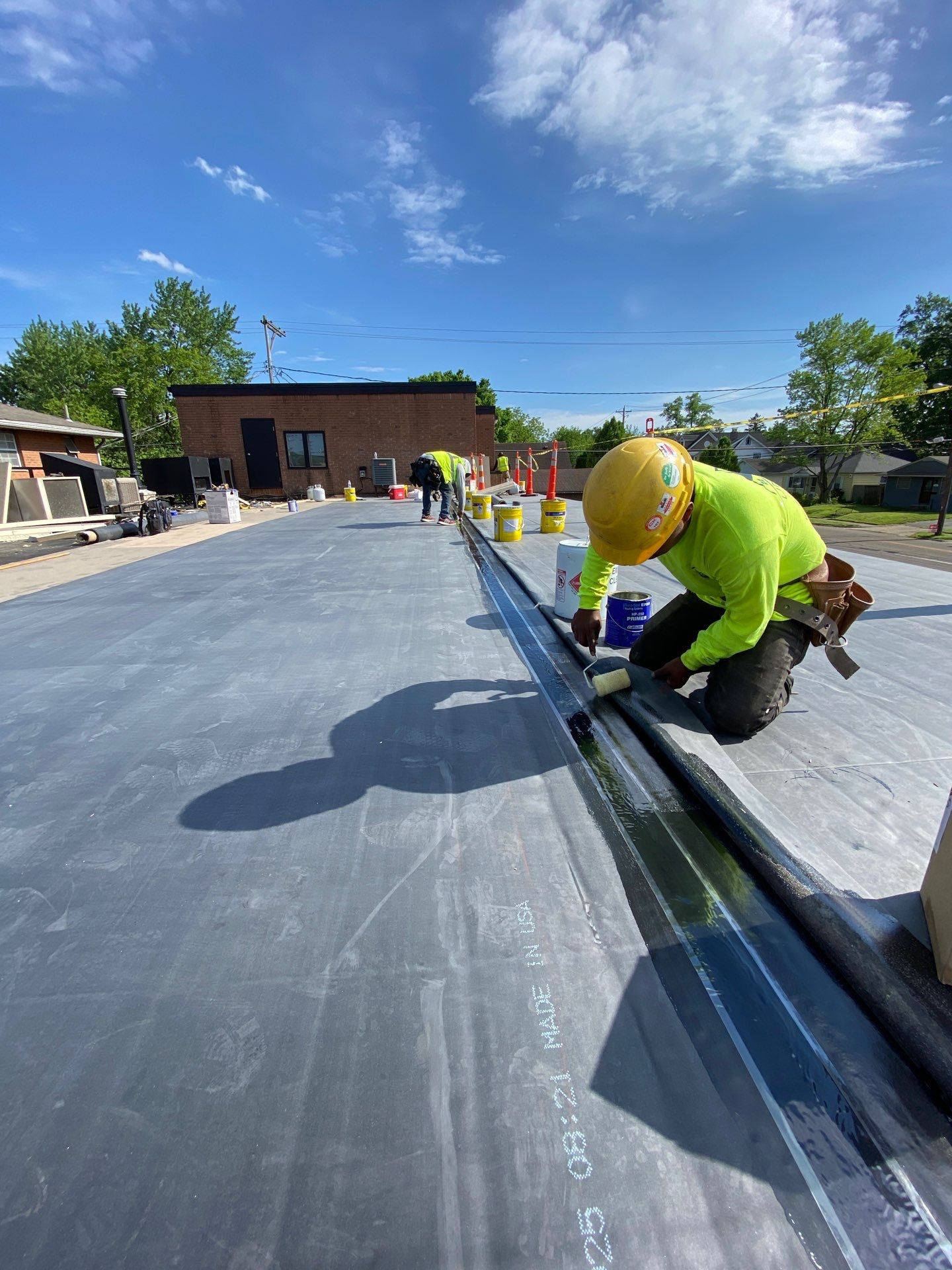 Commercial Roofing Installation using 60 mil rubber roof  by Nitro Roofing and Construction