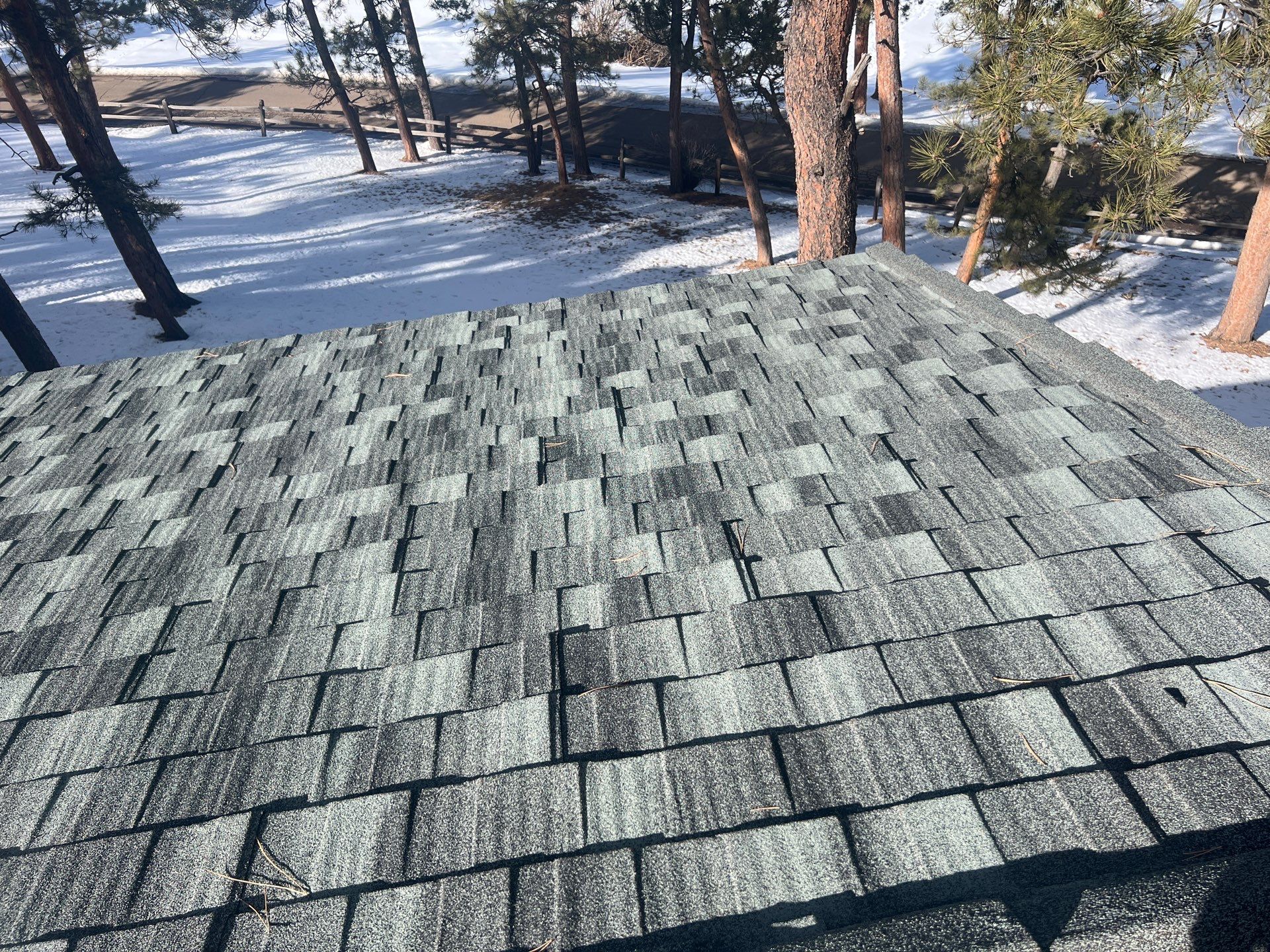 Residential Roofing Installation using Stone Coated Steel by Blue Peaks Roofing LLC 