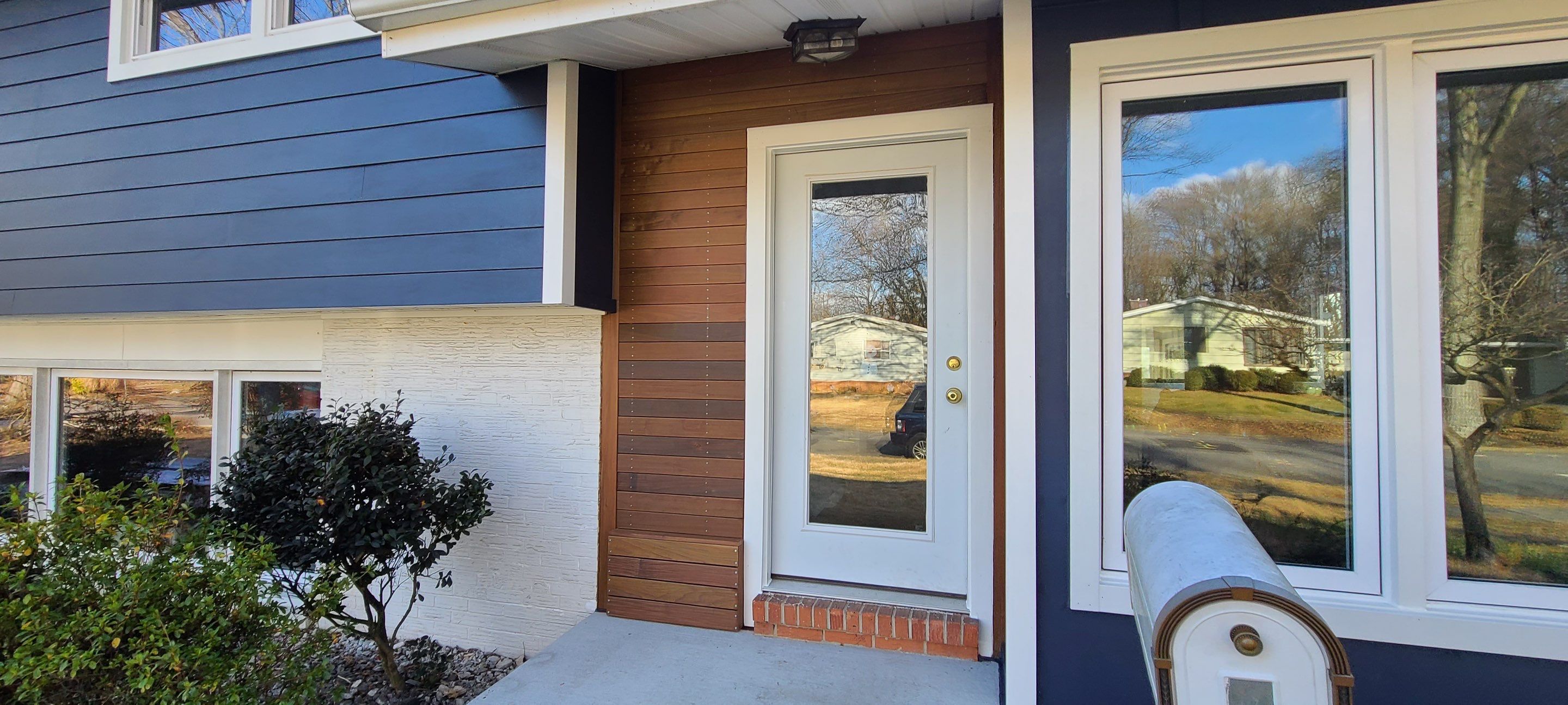 Siding Installation using James Hardie Siding with IPE accents by Window Depot of Annapolis