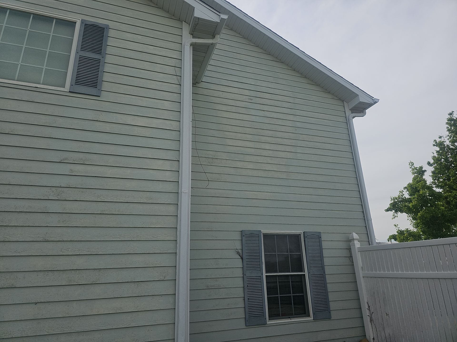 Residential Roof + Gutters & Downspouts Install  by Titan Commercial & Residential Roofing 