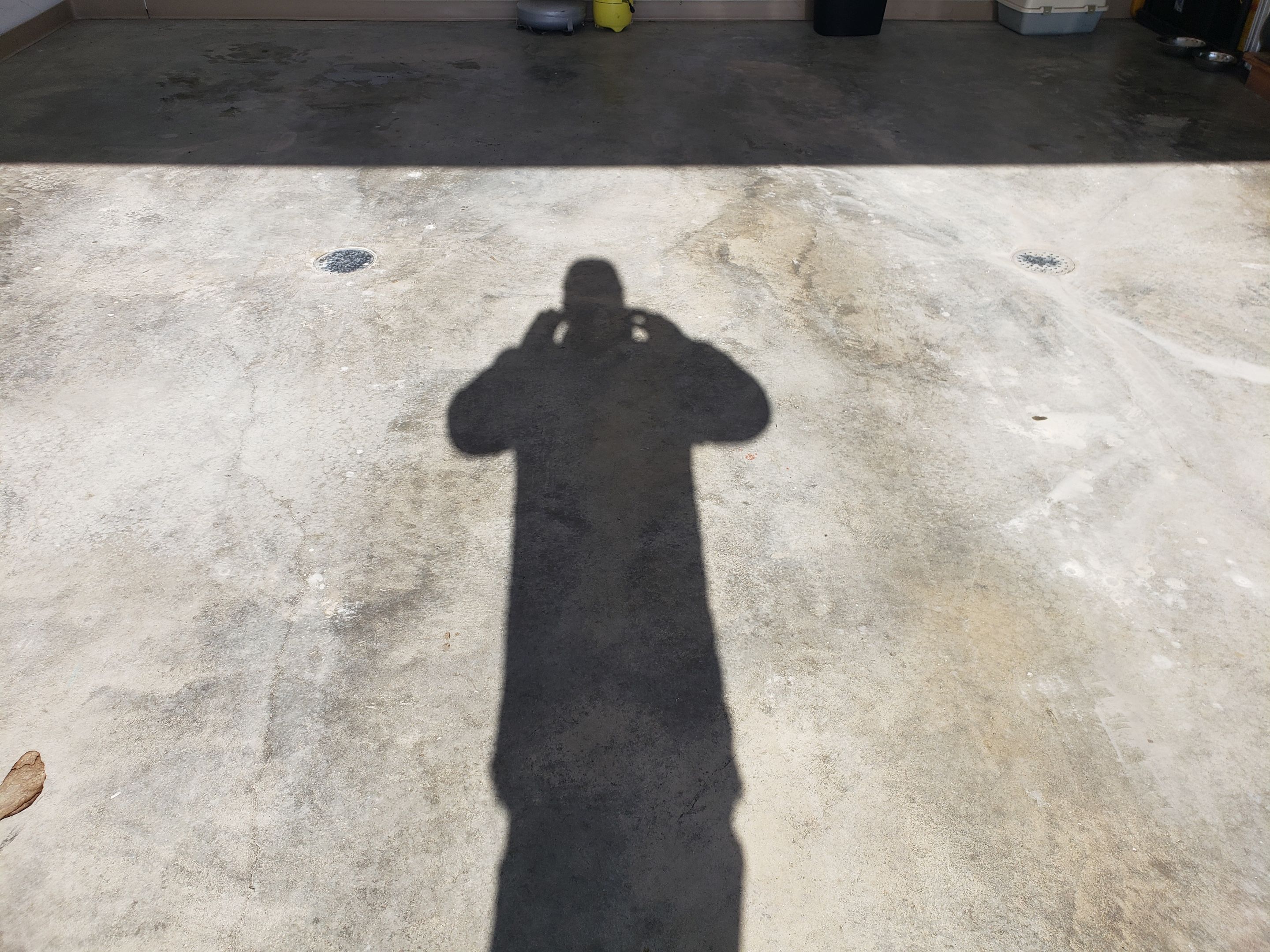 St. Joseph -- Front Patio and Garage Epoxy Garage Coating System by Big Red Decorative Concrete, LLC