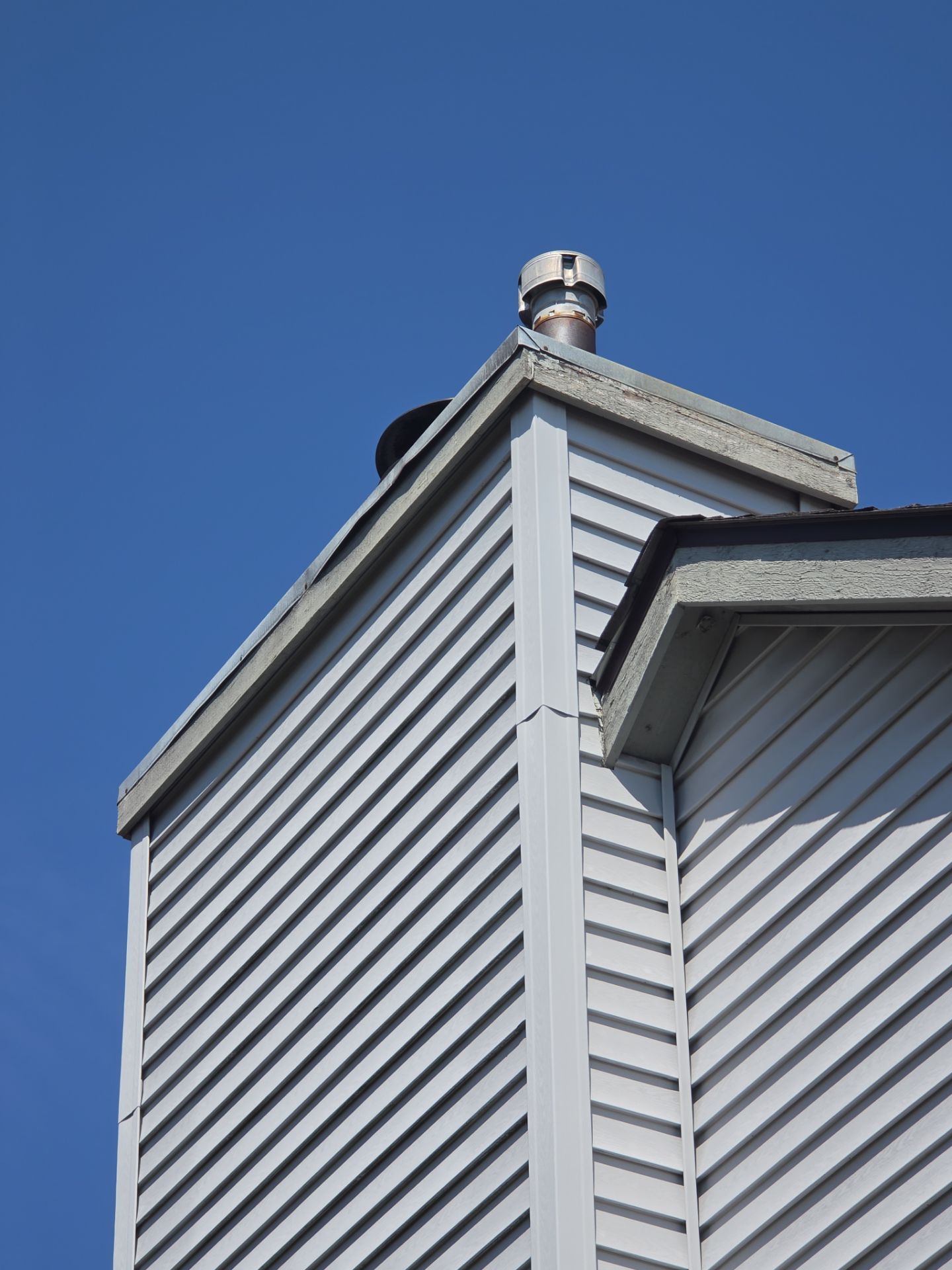 Exterior Siding and Wood Trim Restoration in Ypsilanti by Top Shelf Painter