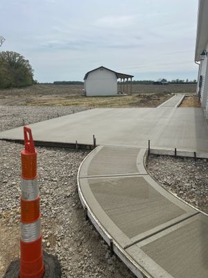Custom Residential Concrete Walkways and Drainage Installation in Waldo