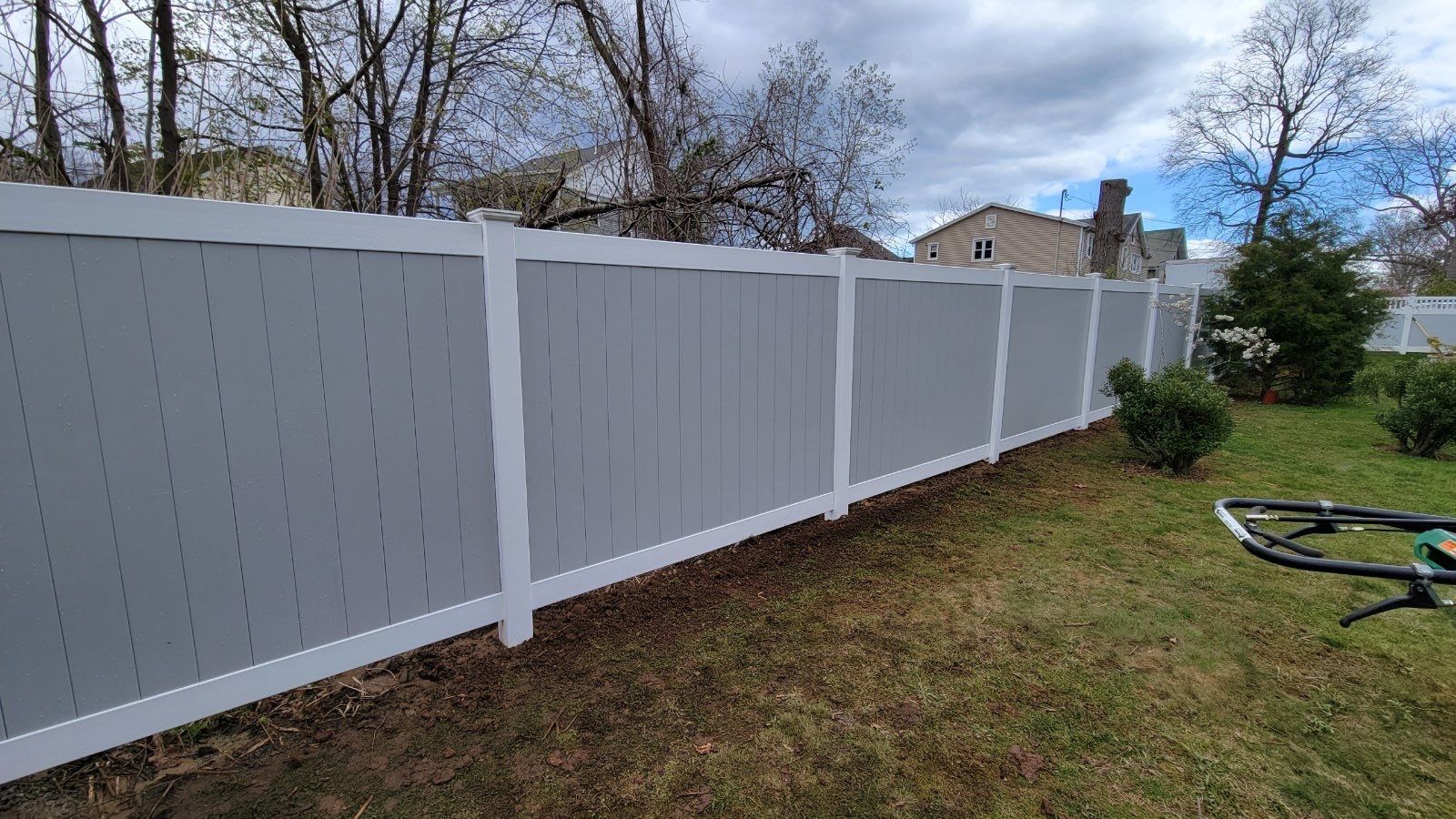 Vinyl privacy fence 6' tall, 2 tone White and Gray. by DiGiorgi Roofing and Siding Inc