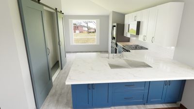 Modern Kitchen Remodel with Blue Cabinetry
