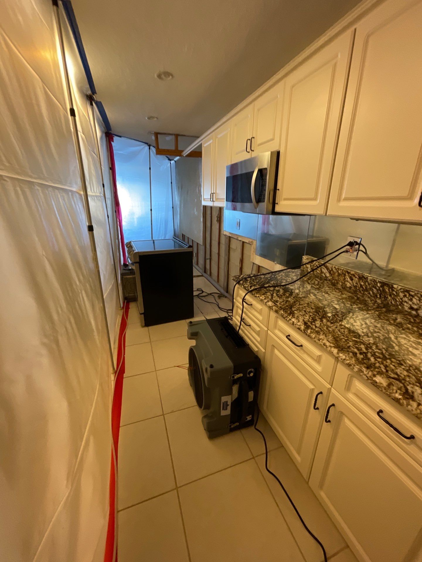 Mold remediation and rebuild of kitchen and living areas by Bay Coast Restoration 