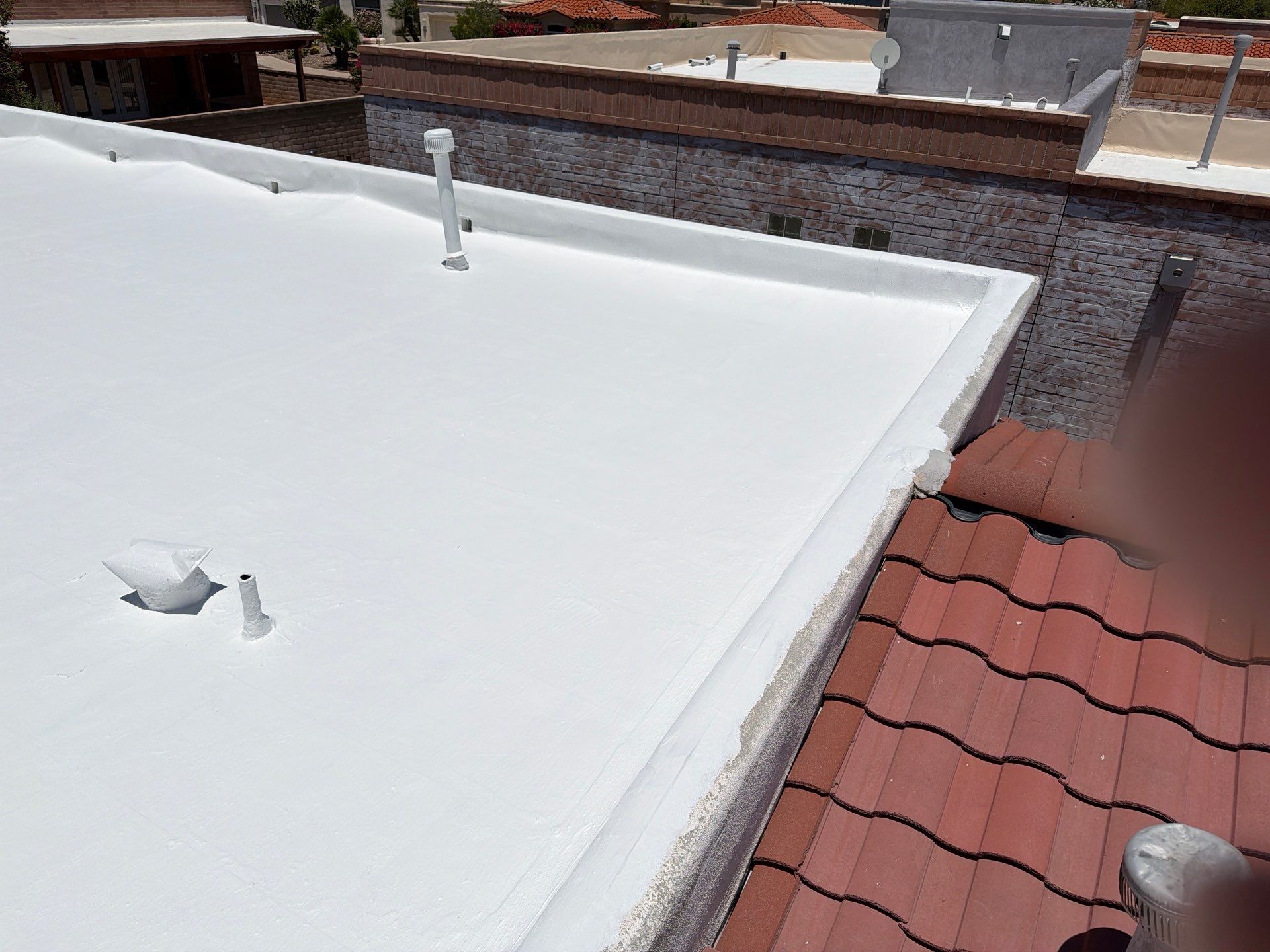 Tucson Residential Roof Restoration with Tile and Elastomeric Coating by West Coast Roofing AZ