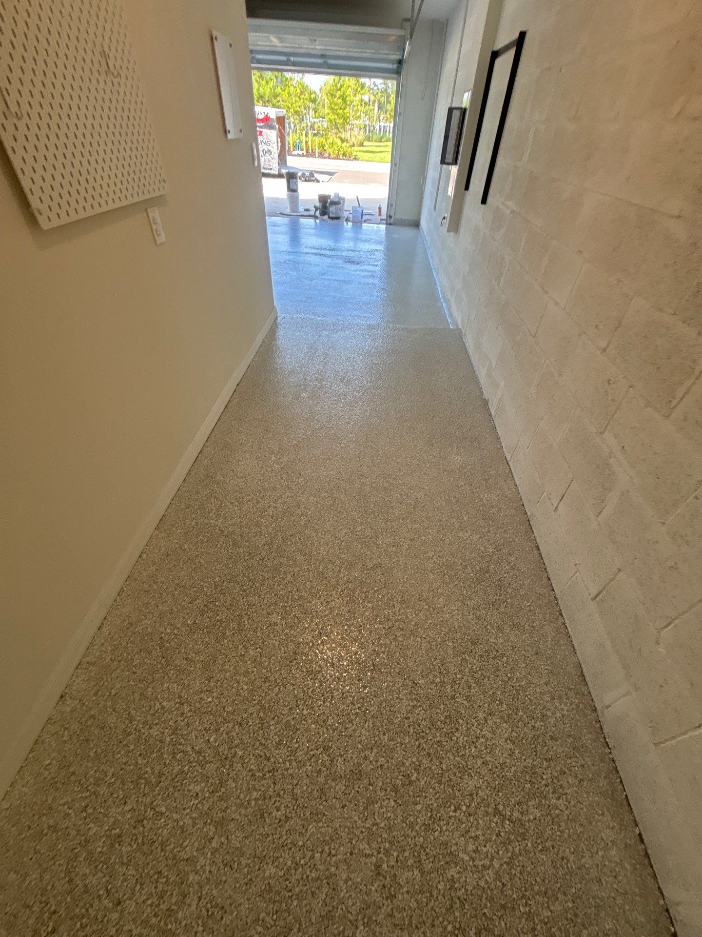 Flake Epoxy Garage Floor Coating System in Zephyrhills by Performance Floors & Coating