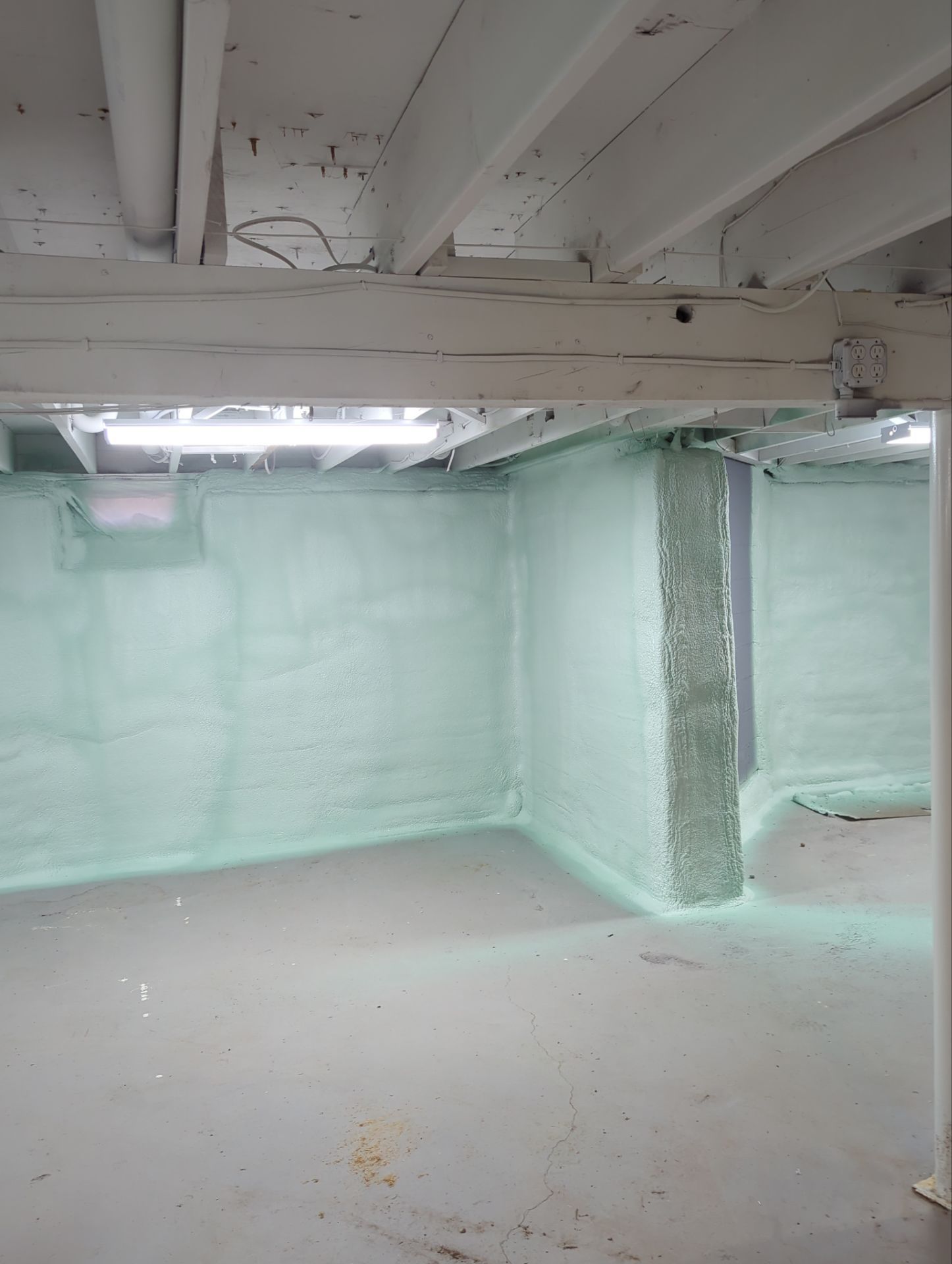 Basement Exterior Walls using Closed Cell Spray Foam by NYS Foam & Energy