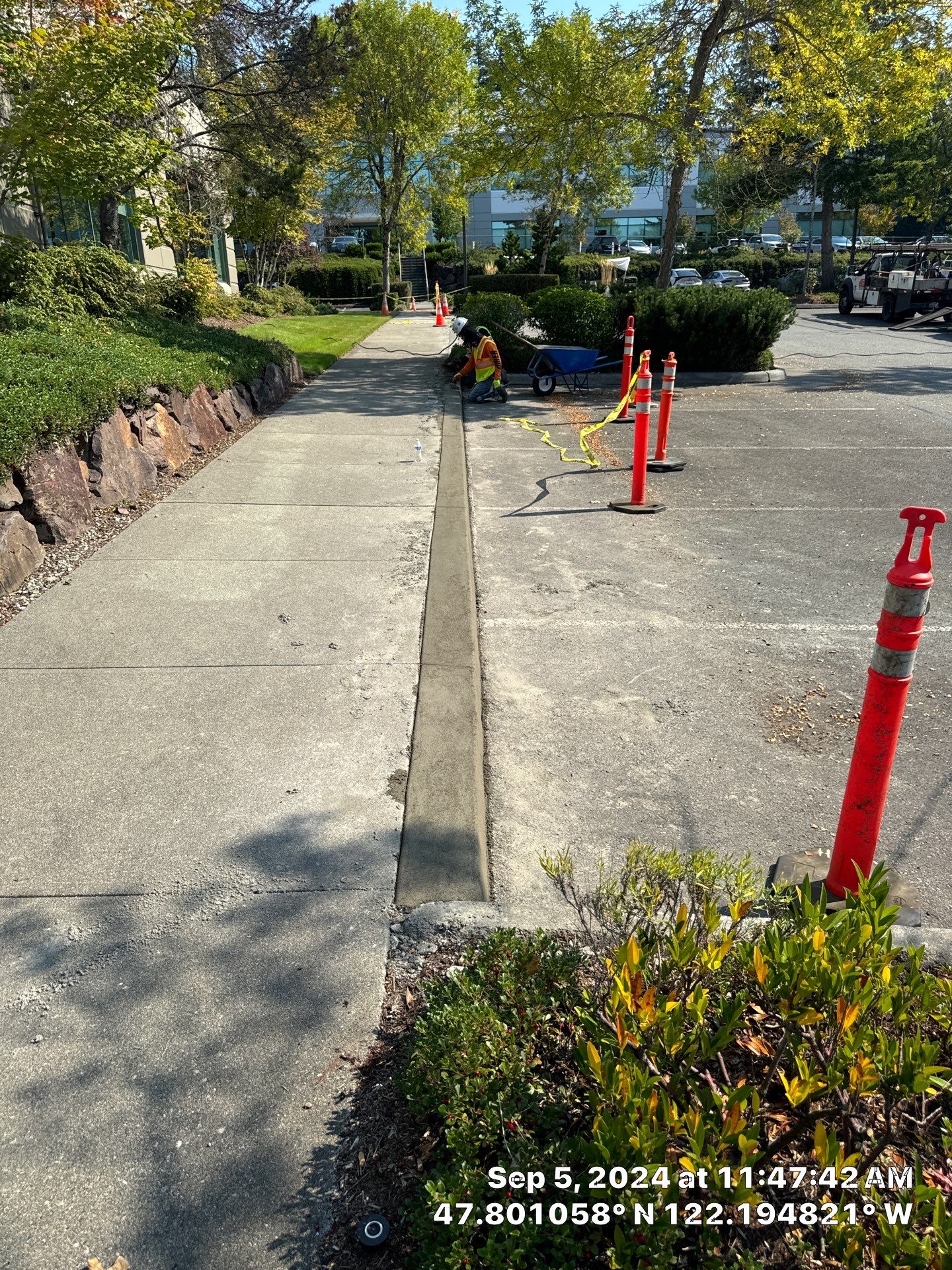 Kidder Matthews | Parking Lot Sealcoating & Striping with Concrete Curb & Patch Repairs  by Jireh Asphalt & Concrete Inc 