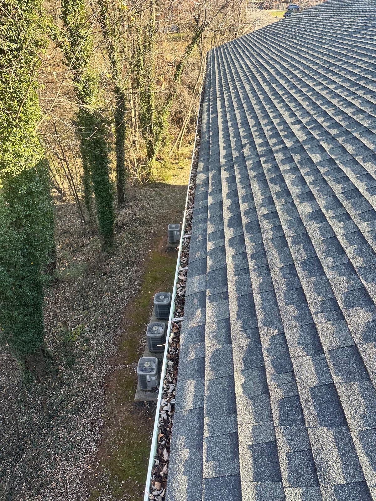 Commercial gutter cleaning Roanoke, VA before photo with filled gutters