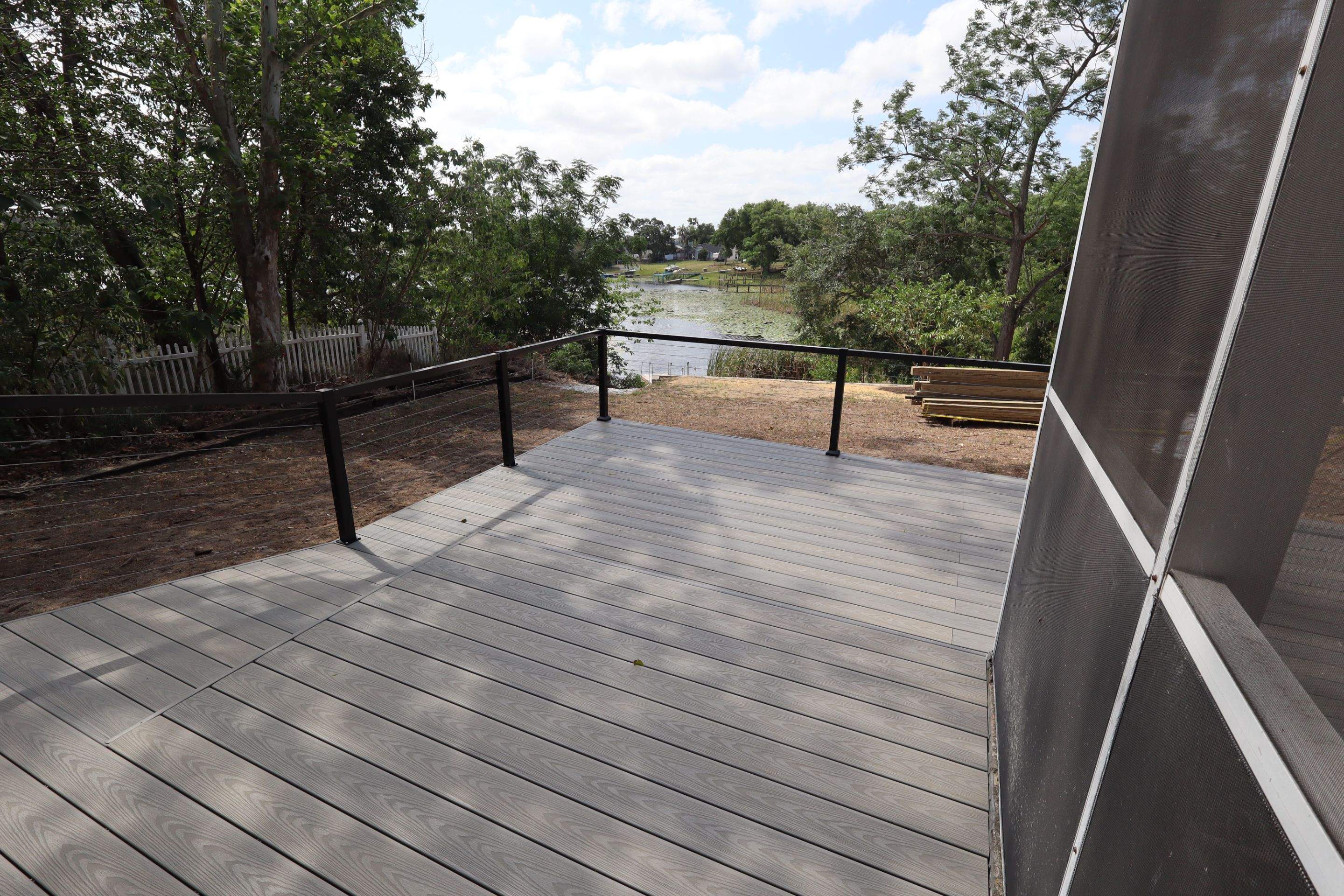 Composite deck and aluminum railings by Orlando pergolas