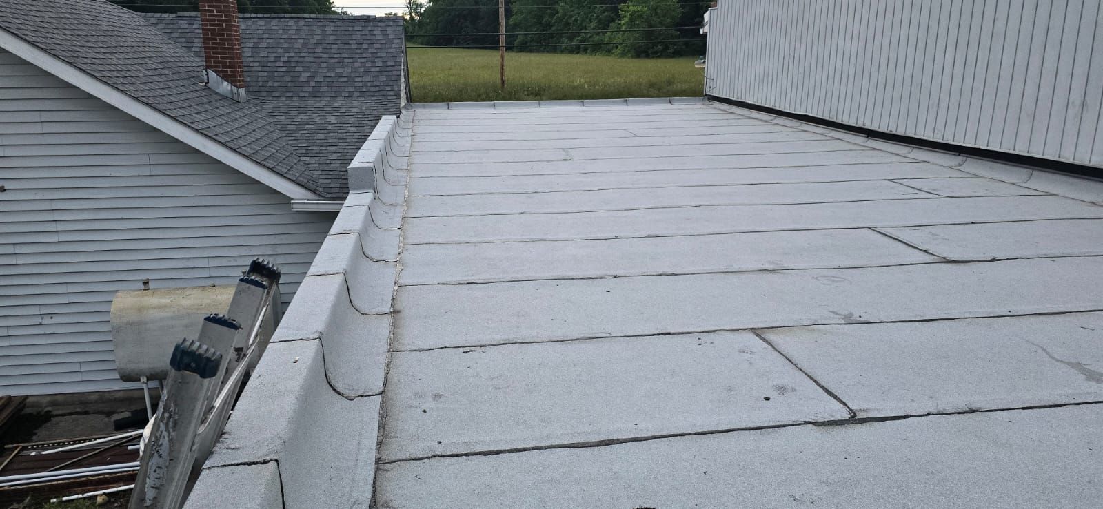 Roof Installation using Silicone APP Elevate Coating by ExteriorPros