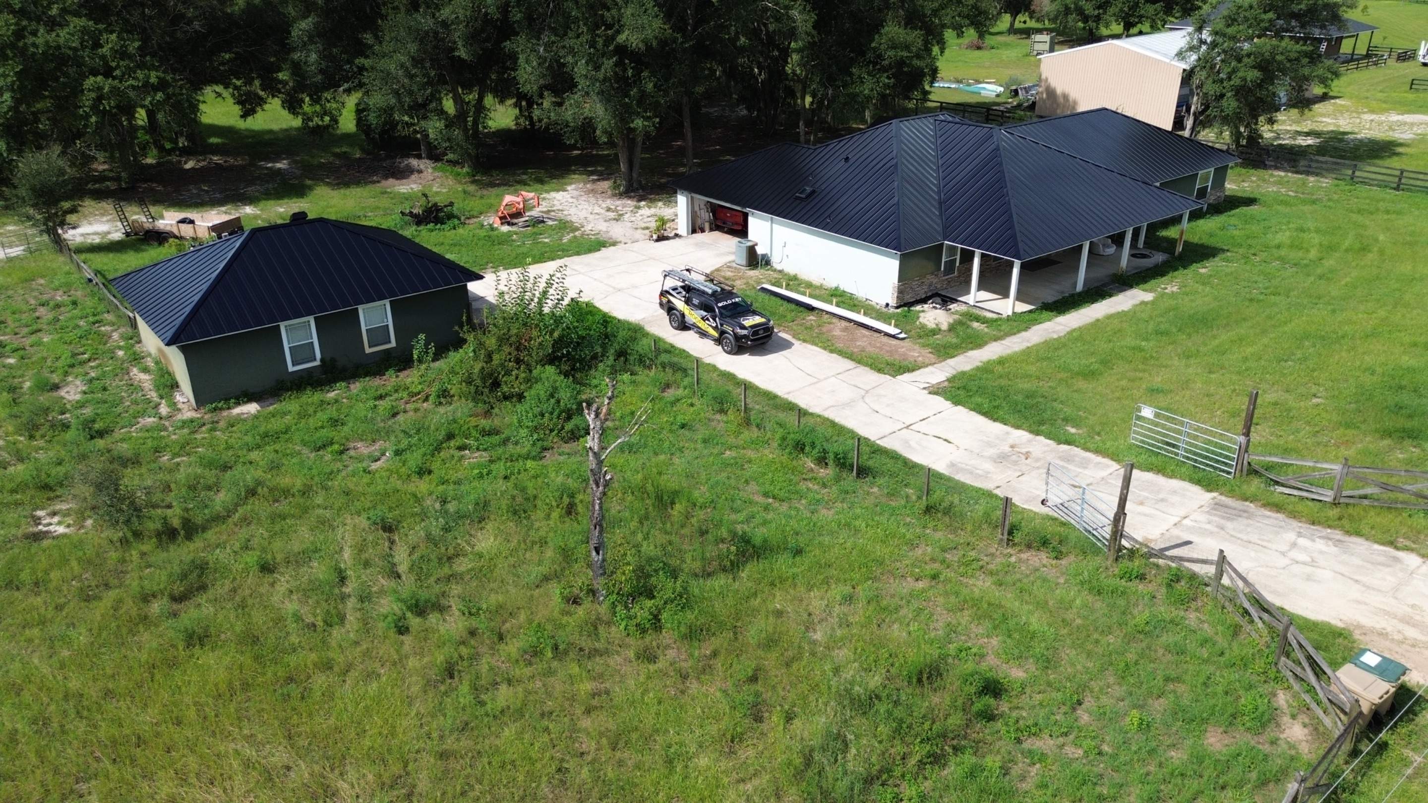 Residential Reroof | Architectural Shingles to 26 Gauge Standing Seam Metal | Groveland Fl by Gold Key Roofing