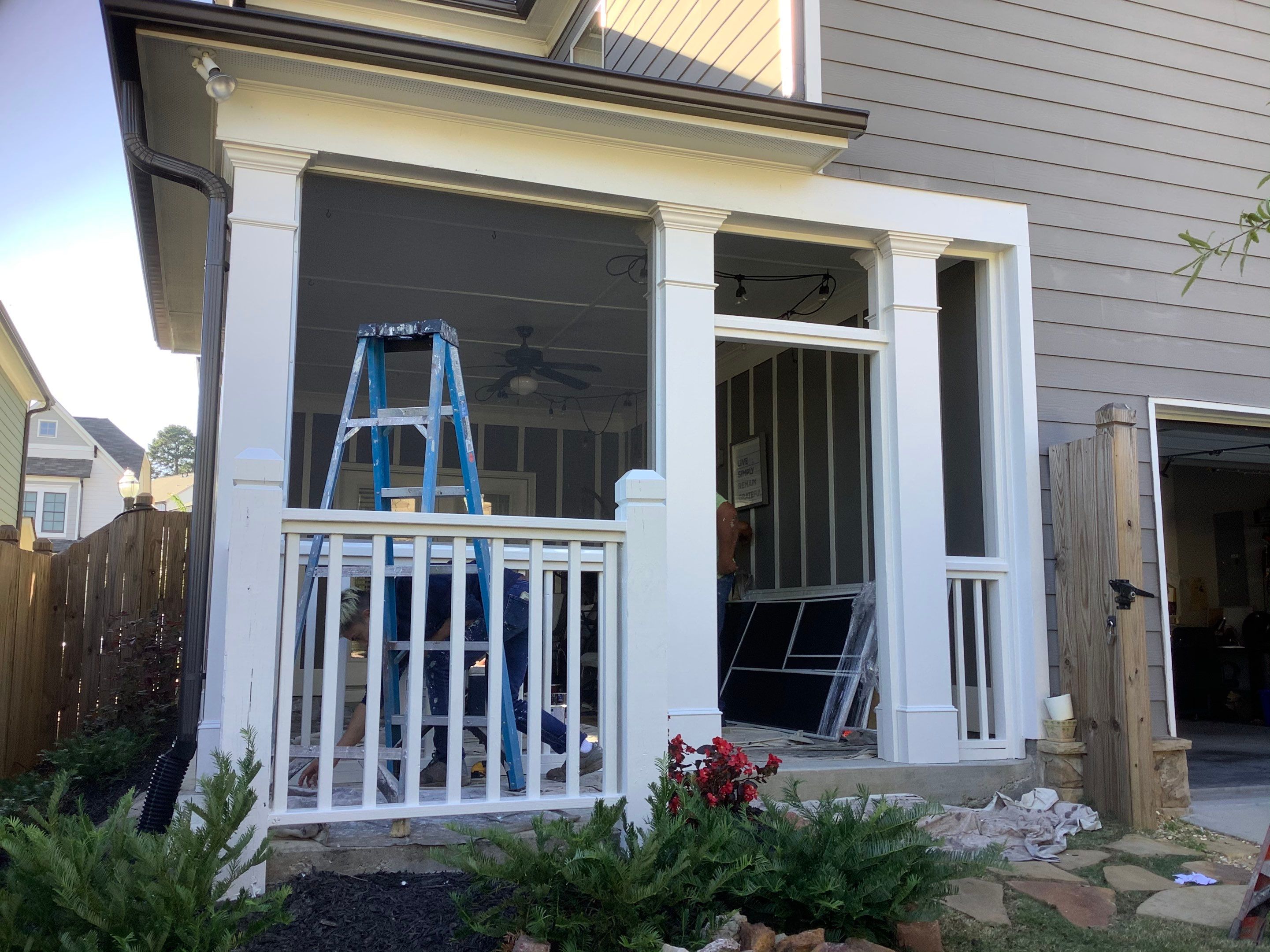 Custom Screened-In Porch Enclosure with White Railings in Smyrna by Swift Home Renovations