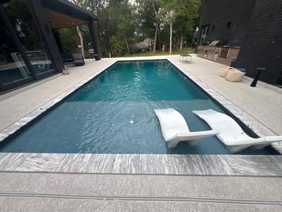 Modern Geometric Pool with Tanning Ledge