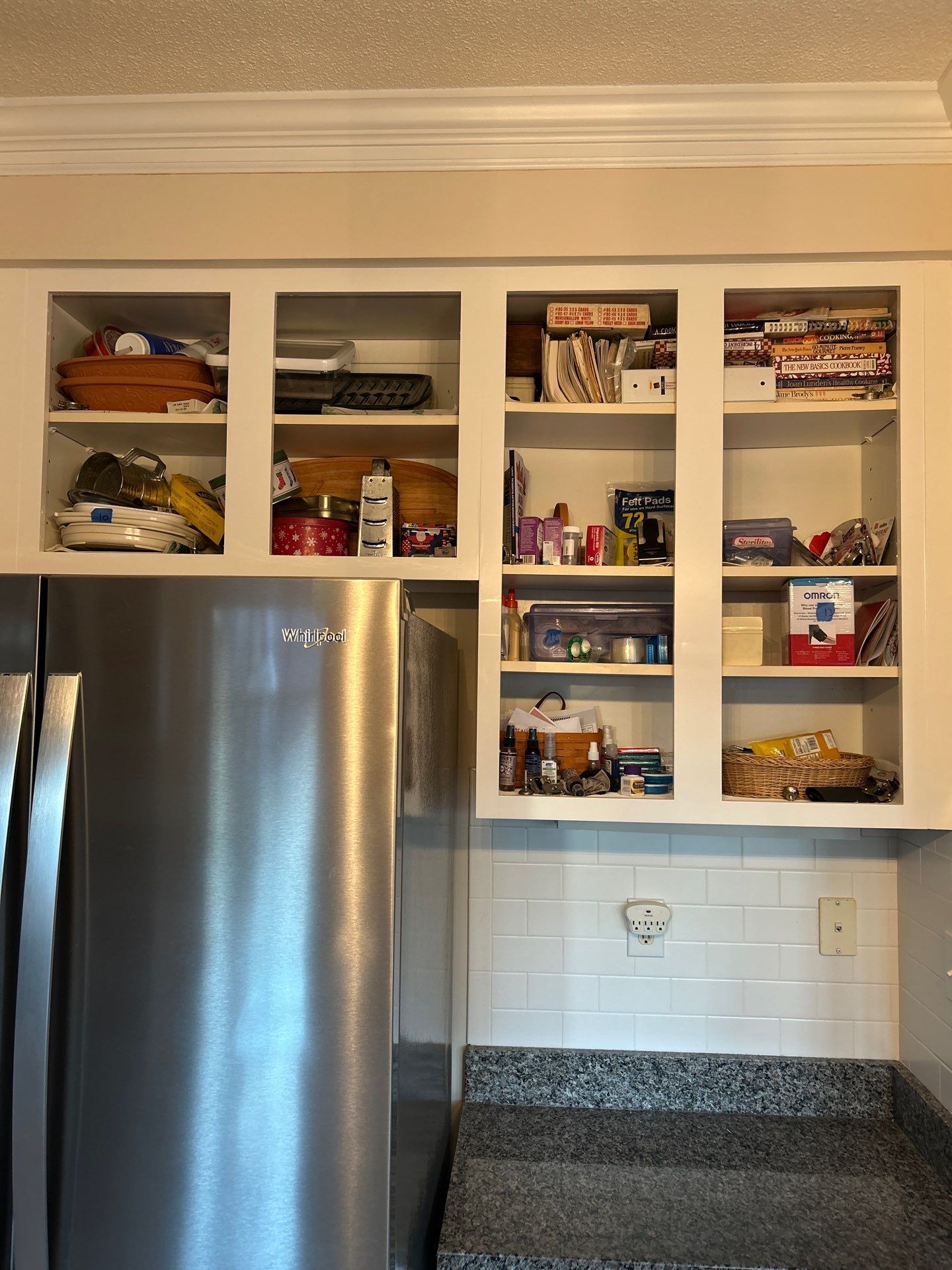 Cabinet painting by GonzalezPainters & Contractors Inc 