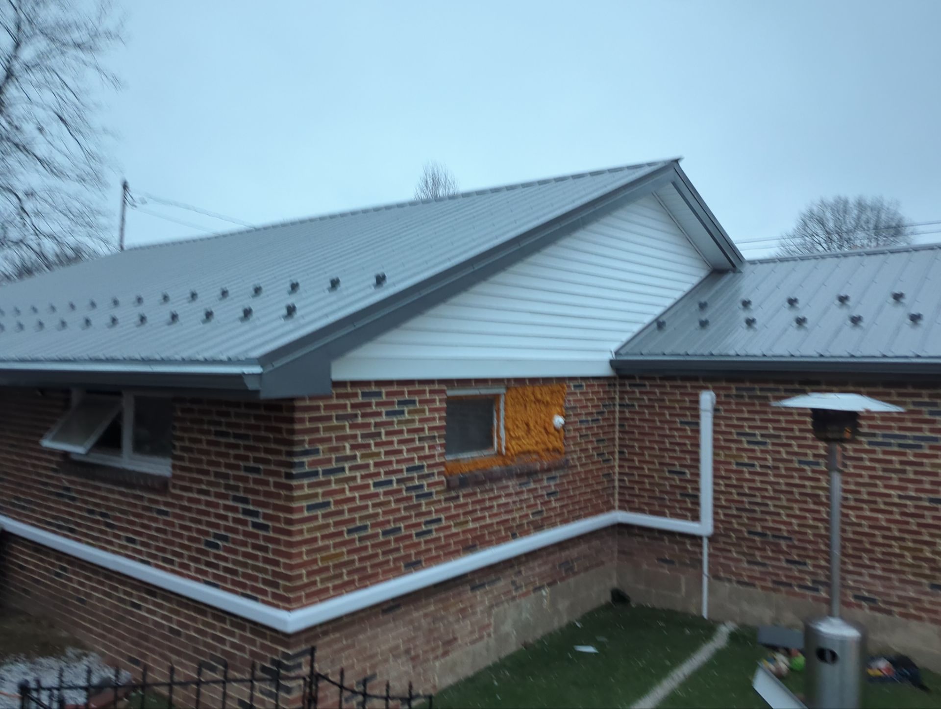 Metal Roofing Replacement and Sunroom Addition in Halifax by Esh Builders