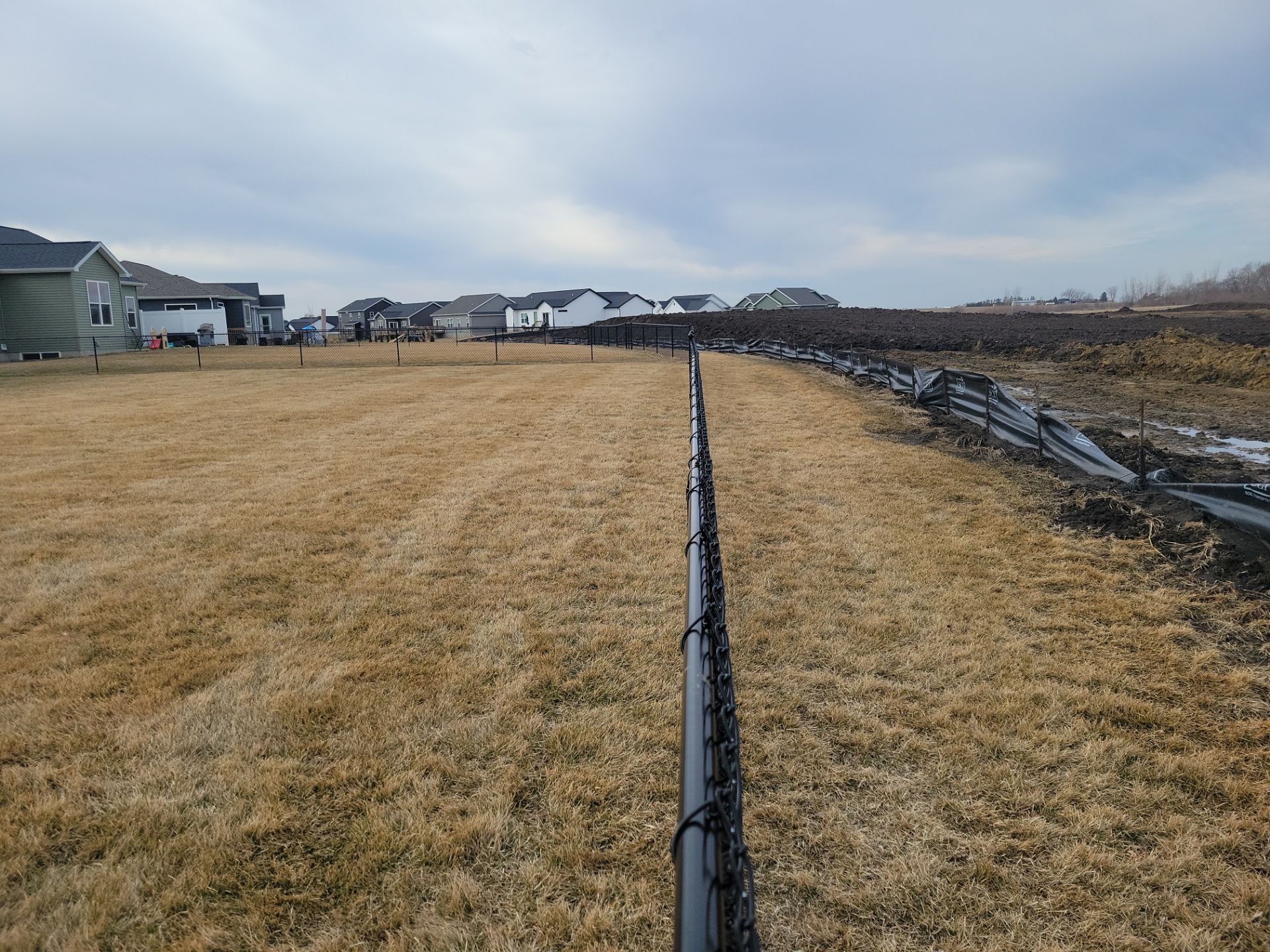 Black Chain Link Fence and Gate Installation in Cedar Falls by Perfect Picket Fence and Stain