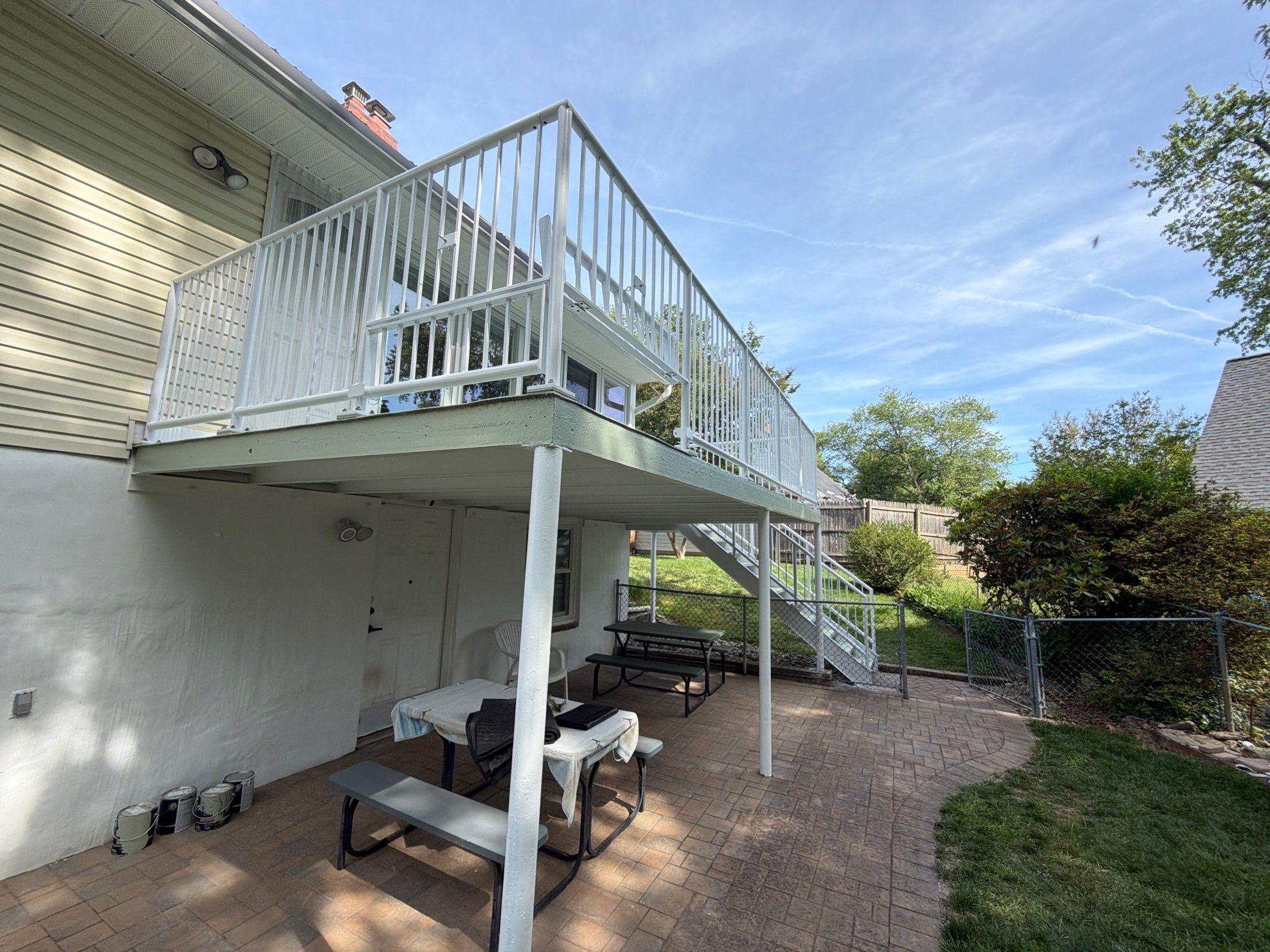 White Powder-Coated Outdoor Railings in Rockville & Staircase and Deck Refurbishment  by Capitol Iron Works