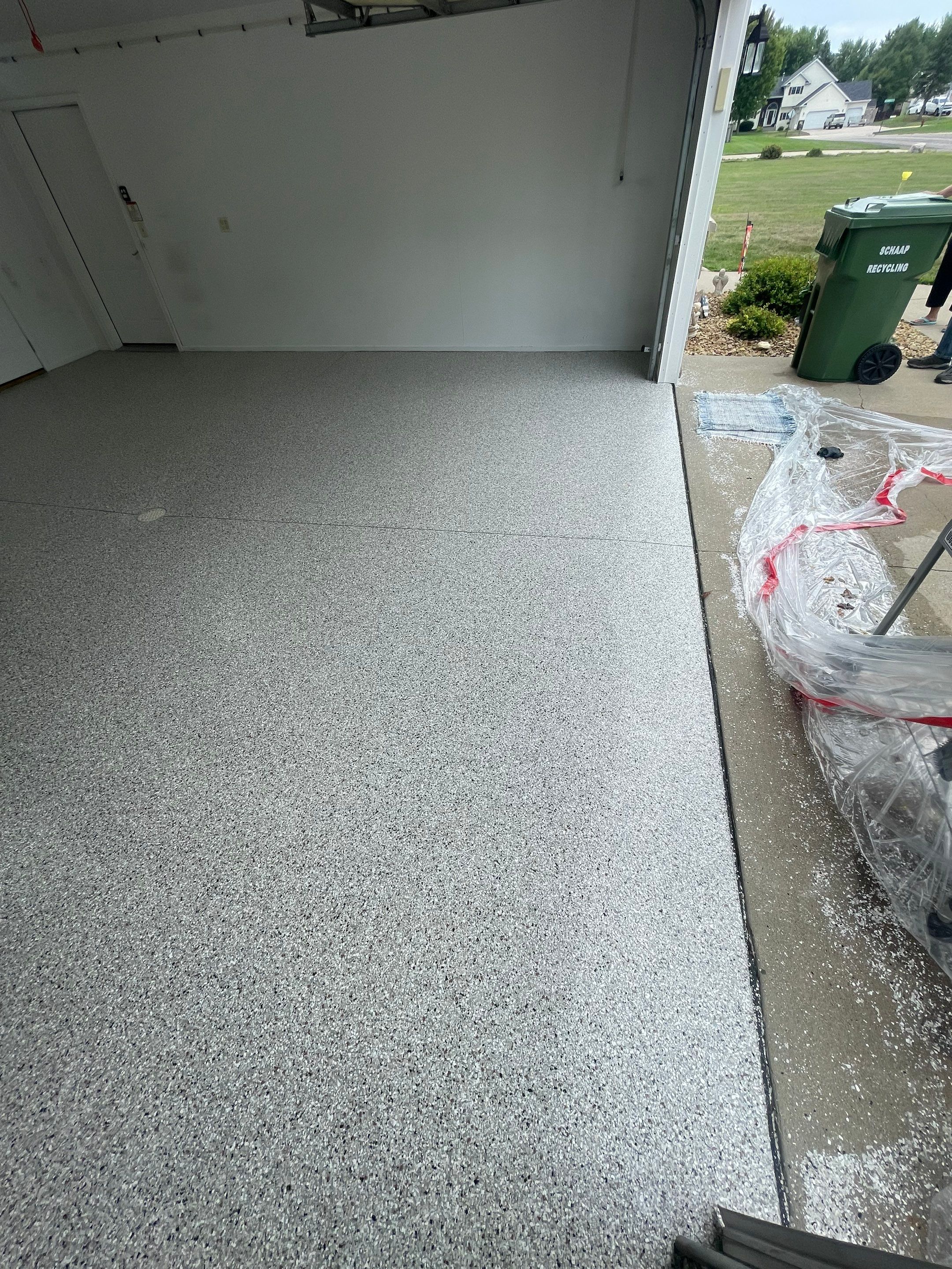 Coyote Flake Garage Floor Coating in Worthington, Minnesota by Select Painting, Coatings & Garage Cabinets