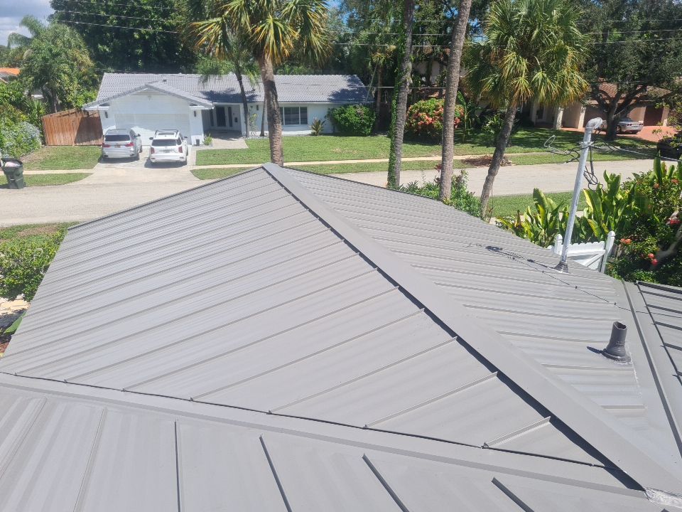Residential Roofing Installation using 1" Nail strip metal roof by BLUES BROTHERS CONSTRUCTION CORP