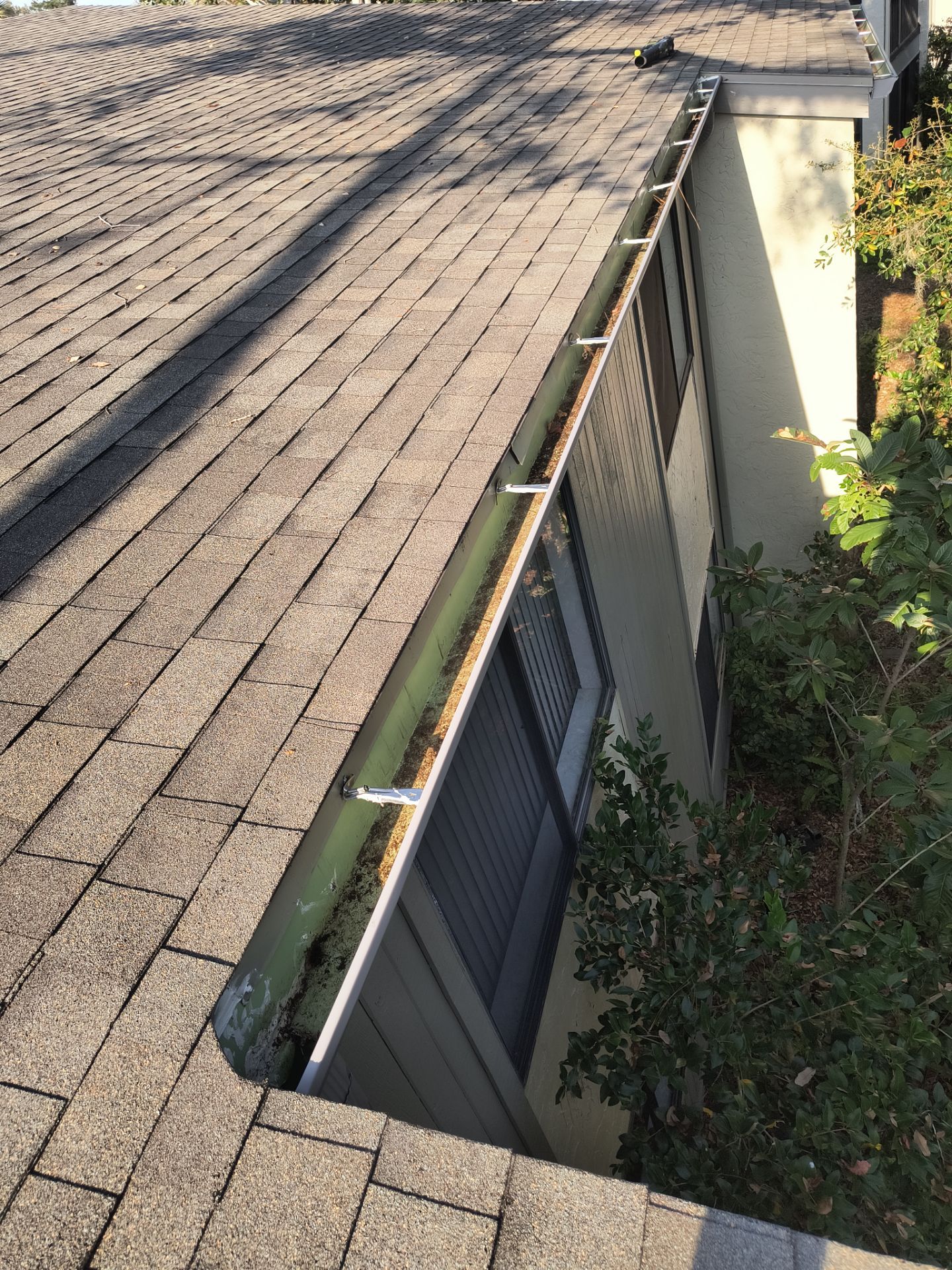 Professional Gutter cleaning Aluminum Seamless Gutters  in Sarasota FL by Gutter Professors