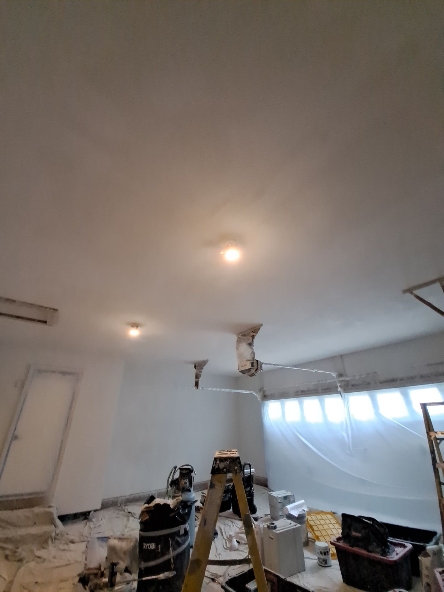 Garage dry wall repair/ re-texture, re-paint by Gordon Painting