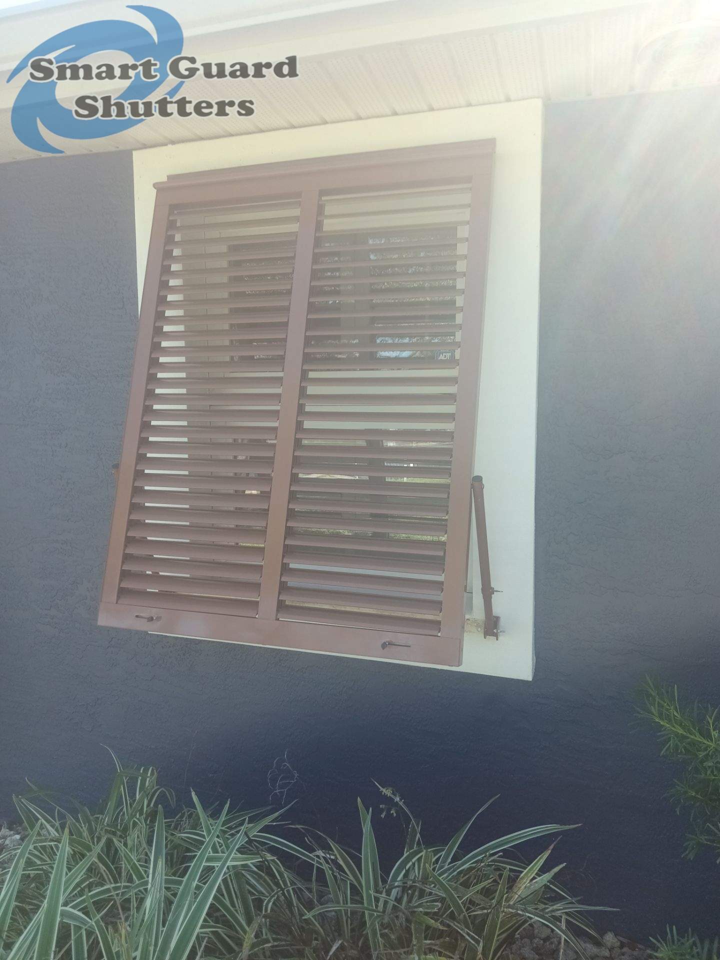 Impact Bahamas in Beige Brown by Smart Guard Shutters