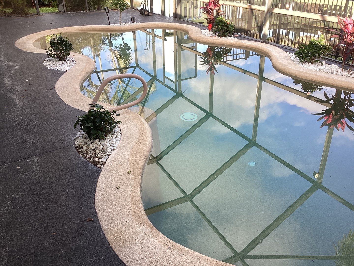 Pool Deck using Pecan by Amvet concrete coatings llc