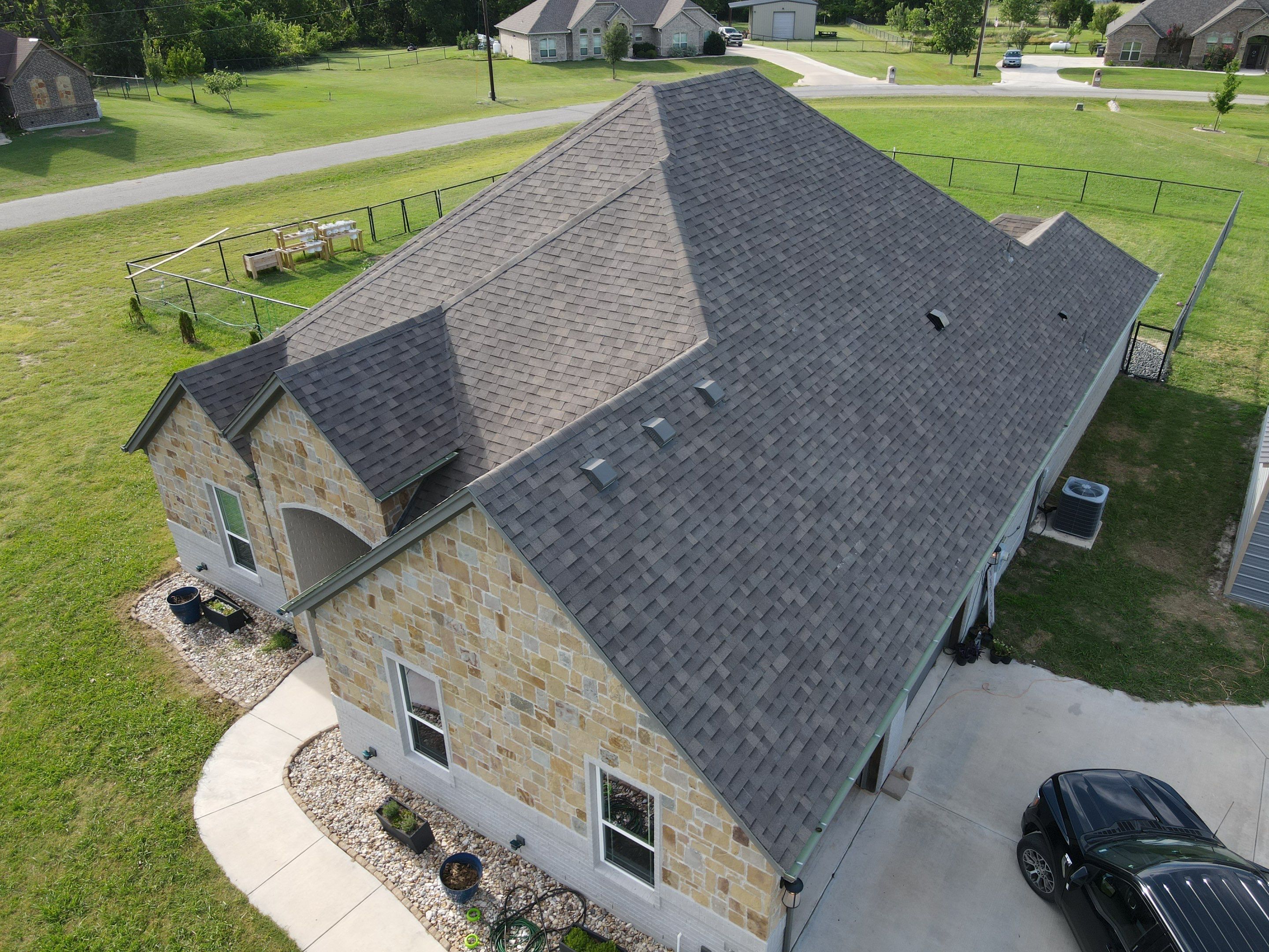 Architectural Shingle Roof Installation and Gutter Updates in Springtown by Berry Good Roofing
