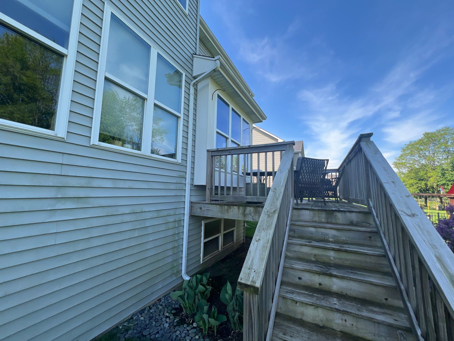 wood deck cleaning and staining by Northern Power Washing LLC.