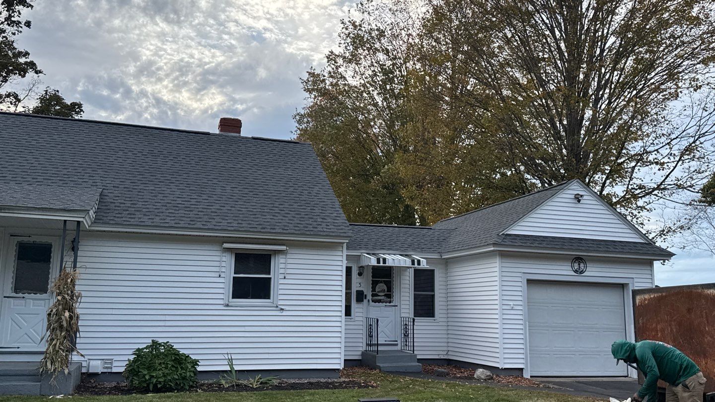 Complete Roof Replacement with GAF Pewter Gray HDZ™ Shingles, VELUX Skylights & New Gutters by Sensible Home Solutions