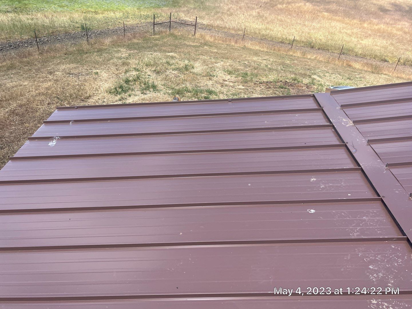 Metal roofing installation using Standing seam metal roofing system by Straight Edge Roofing Inc