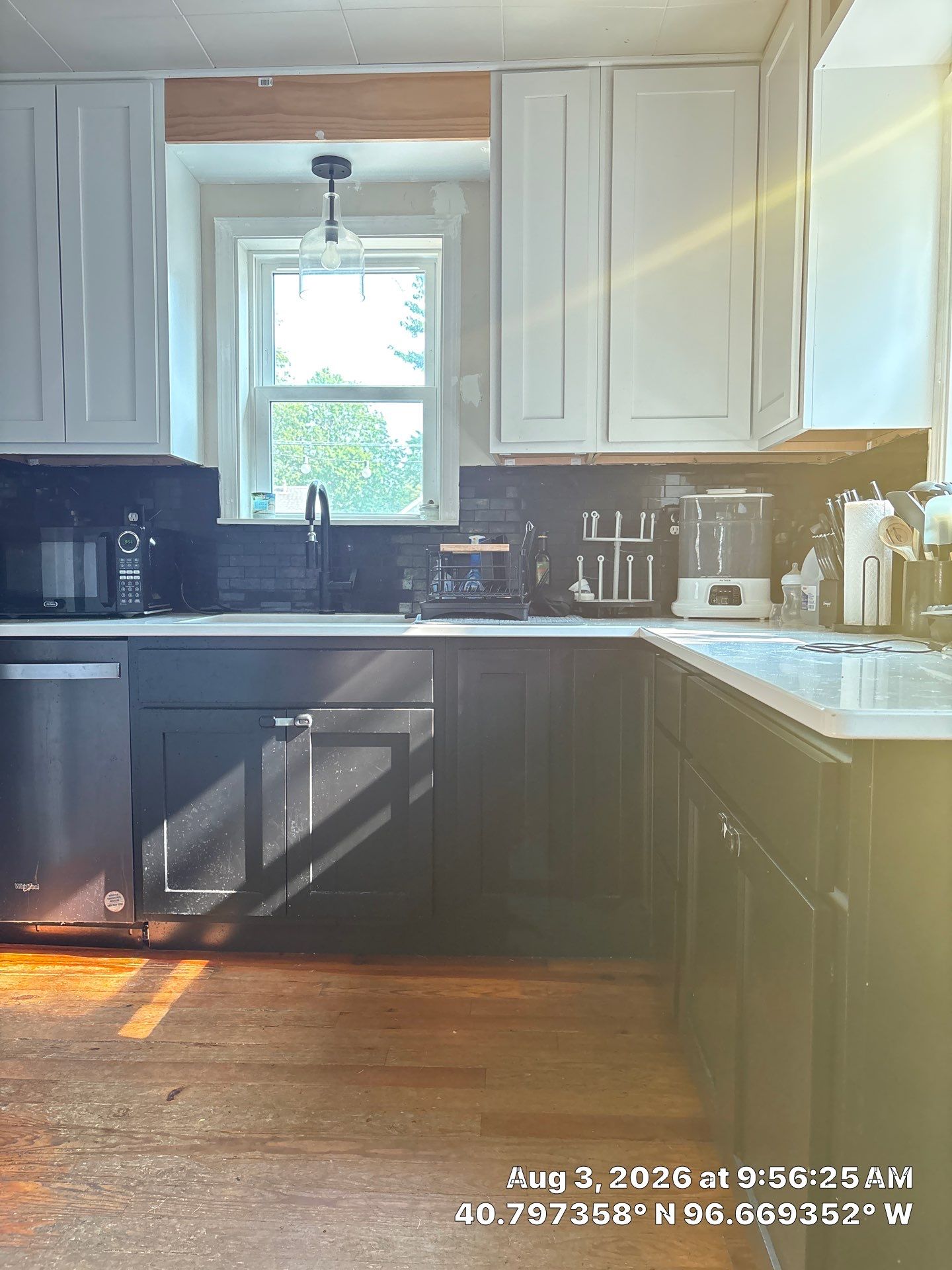 Lincoln Kitchen Remodel With Black and White Two-Tone Cabinetry by CompanyCam Sales Demo